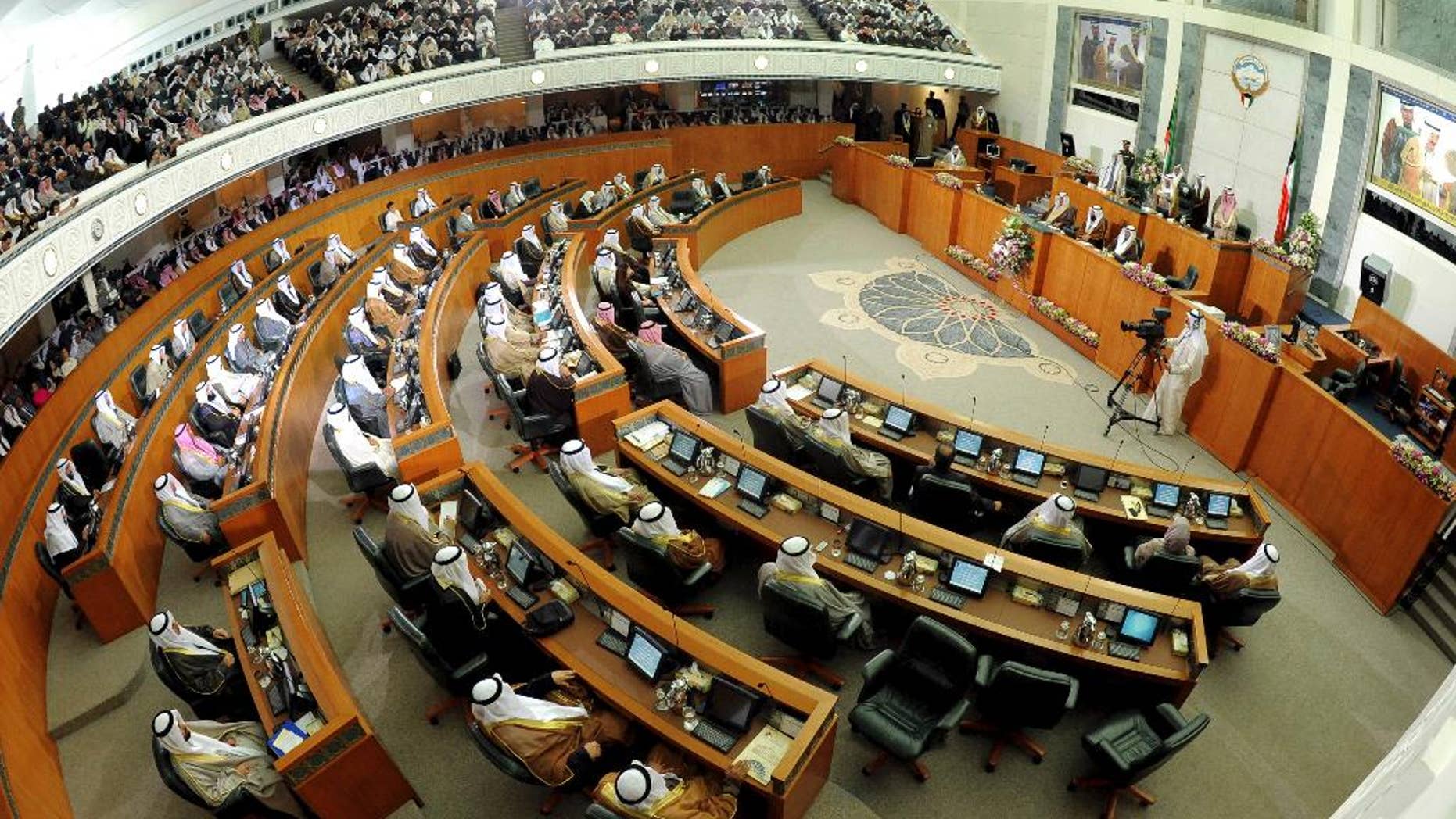 FILE - This Dec. 16, 2012 file photo shows a General view of Kuwait's National Assembly during the inauguration of the 14th Legislative Term of the National Assembly in Kuwait. Kuwait's Cabinet has resigned and its parliament was dissolved Sunday, Oct. 16, 2016, over a "lack of cooperation," setting the stage for early elections. Kuwait's state-run television and news agency made the announcement after an emergency government meeting. In a decree, Kuwait's ruling emir Sheikh Sabah Al Ahmad Al Sabah said "given the circumstances in the region ... and the security challenges" he had ordered the parliament dissolved. (AP Photo/Gustavo Ferrari, File)