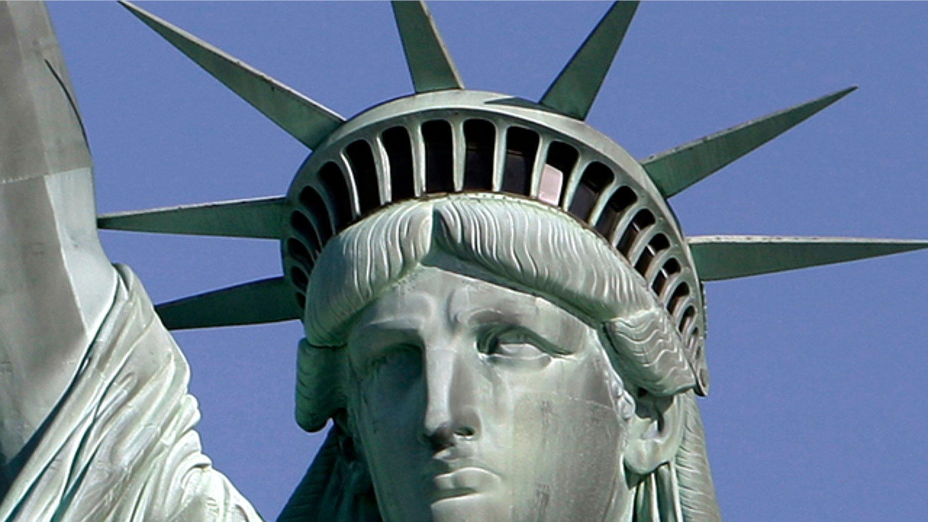 May 20, 2009: The Statue of Liberty against the deep blue sky in New York Harbor. On Friday, Oct. 28, 2011 the statue will host the 125th anniversary of its dedication with a Naturalization Ceremony, the presentation of a gift to continue its preservation and an evening fireworks display.