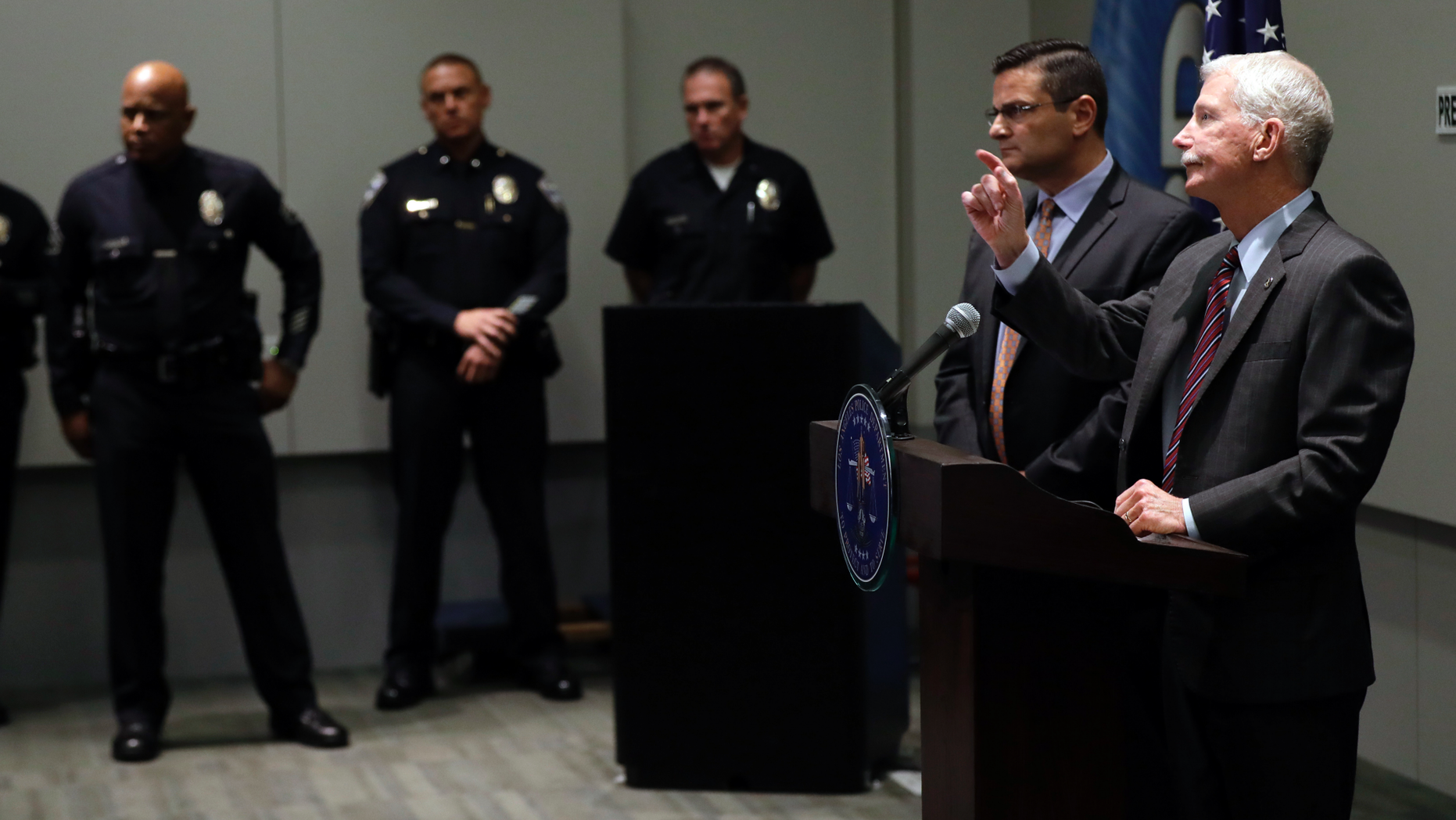 Capt. Billy Hayes fields questions at LAPD headquarters Tuesday, Sept. 25, 2018, in Los Angeles. A man arrested on suspicion of beating a Southern California homeless man into unconsciousness and suspected in six other attacks — three of them fatal — also was being investigated in the disappearances of two of the suspect's Texas relatives, officials said Tuesday. (AP Photo/Marcio Jose Sanchez)