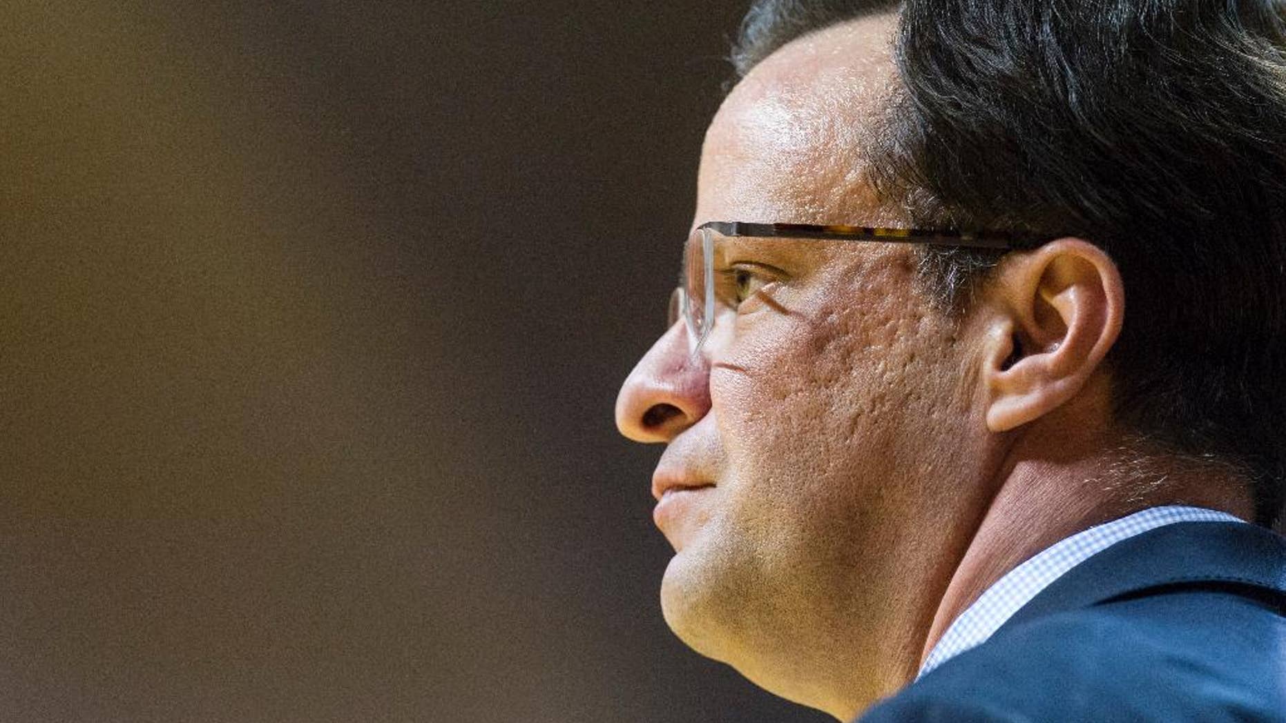 FILE - In this March 5, 2014, file photo, Indiana head coach Tom Crean watches the action on the court during the second half of an NCAA college basketball game against Nebraska in Bloomington, Ind. Three players have been suspended. A fourth is injured. The coach is under fire. And Indiana's first exhibition game, Thursday night, Nov. 6, 2014, against Northwood, can't get here fast enough.(AP Photo/Doug McSchooler, File)
