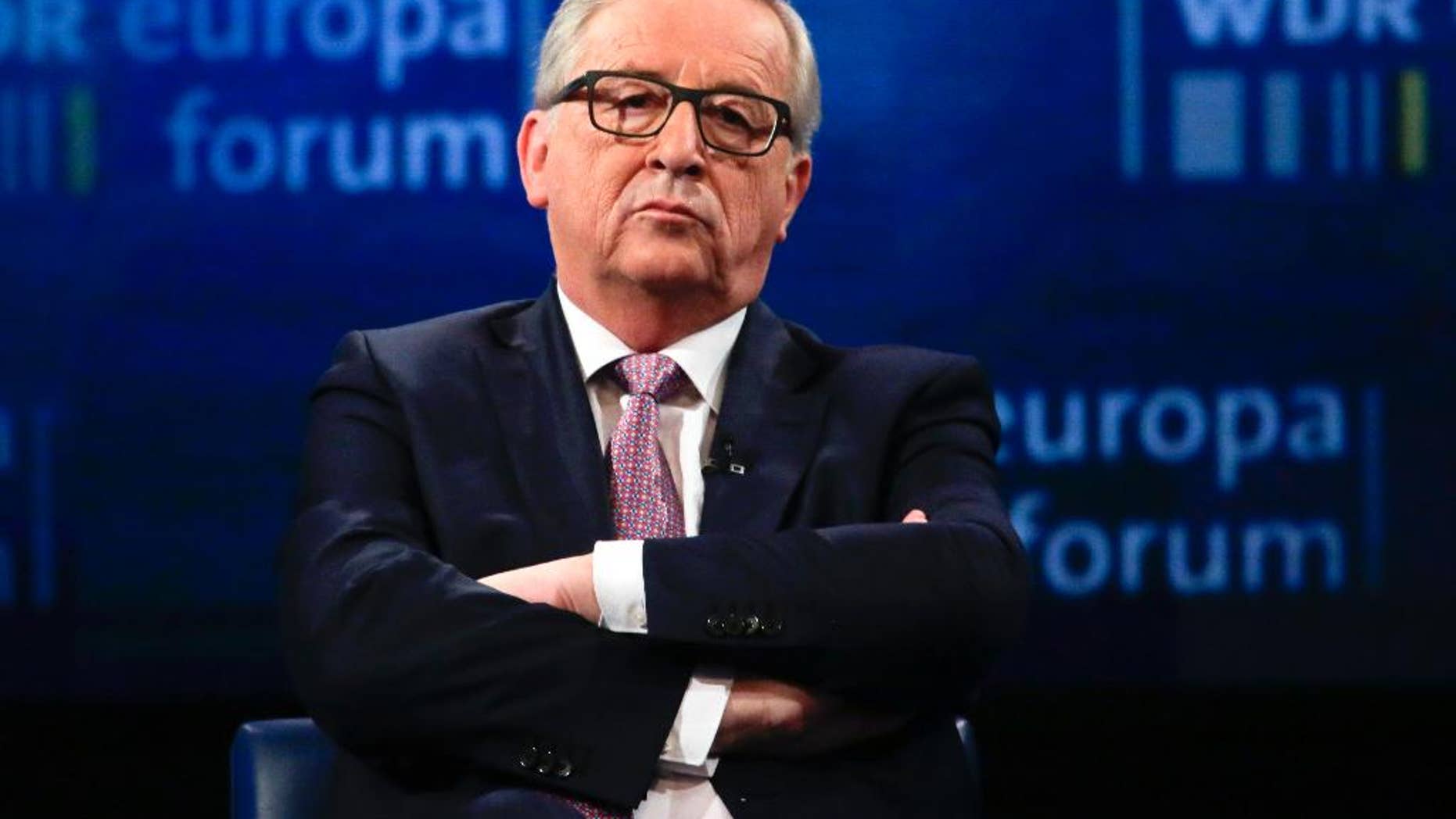 CORRECTS SPELLING OF JUNCKER- The President on the European Commission Jean-Claude Juncker attends a panel discussion about the future of Europe at the Europe Forum event, hosted by the Germany's WDR television and broadcast service, at the Foreign Ministry, in Berlin, Germany, Thursday, May 12, 2016. (AP Photo/Markus Schreiber)