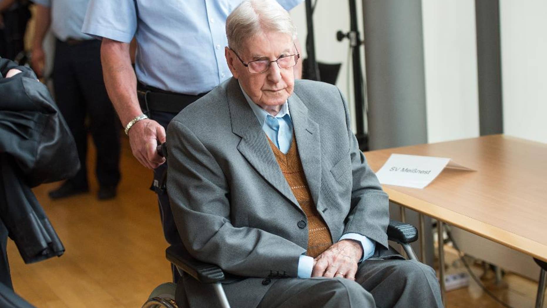 June 11, 2016: A former SS guard at the Auschwitz death camp, Reinhold Hanning, 94, arrives at a courtroom in Detmold, Germany.