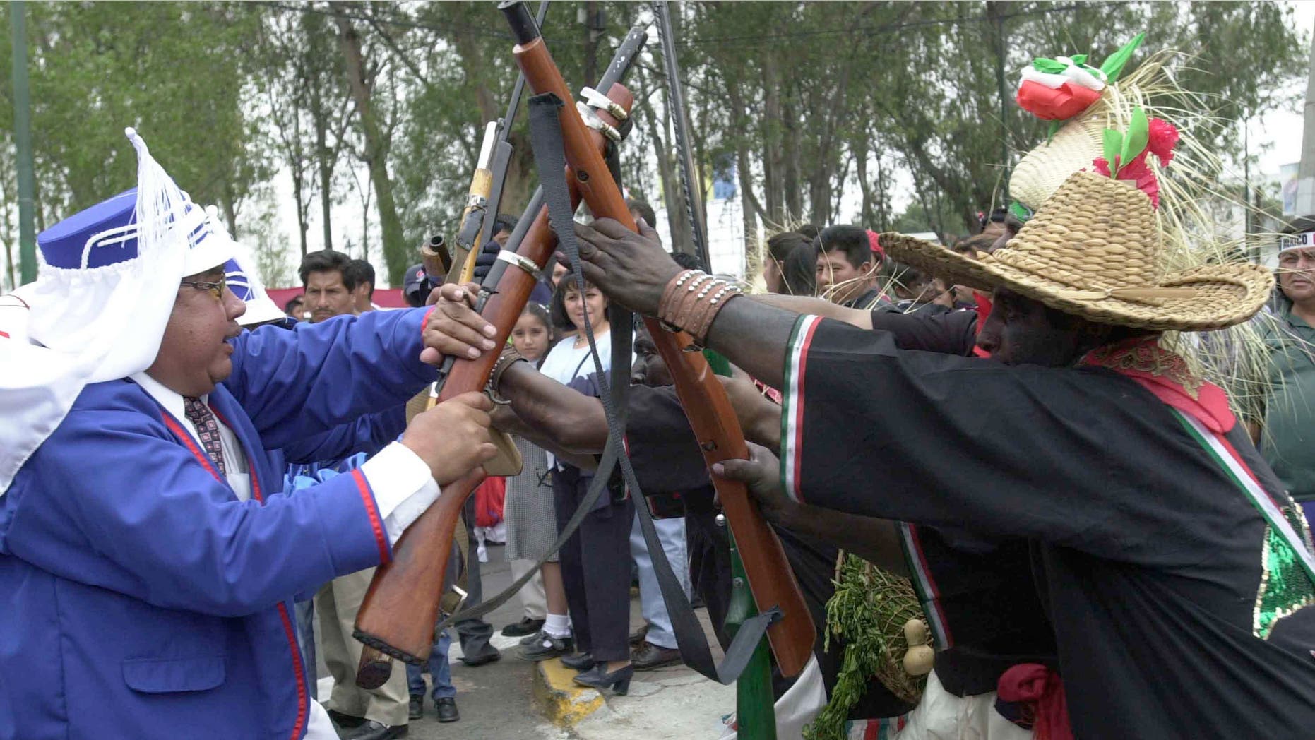 388842 04: Mexicans celebrate Cinco de Mayo with a reenactment of the 1862 battle between the French and the Zacapuaxtlas Indians May 5, 2001 in Puebla, Mexico. Mexicans celebrate their victory over France with reenactements and parades around the country. (Photo by Susana Gonzalez/Newsmakers)