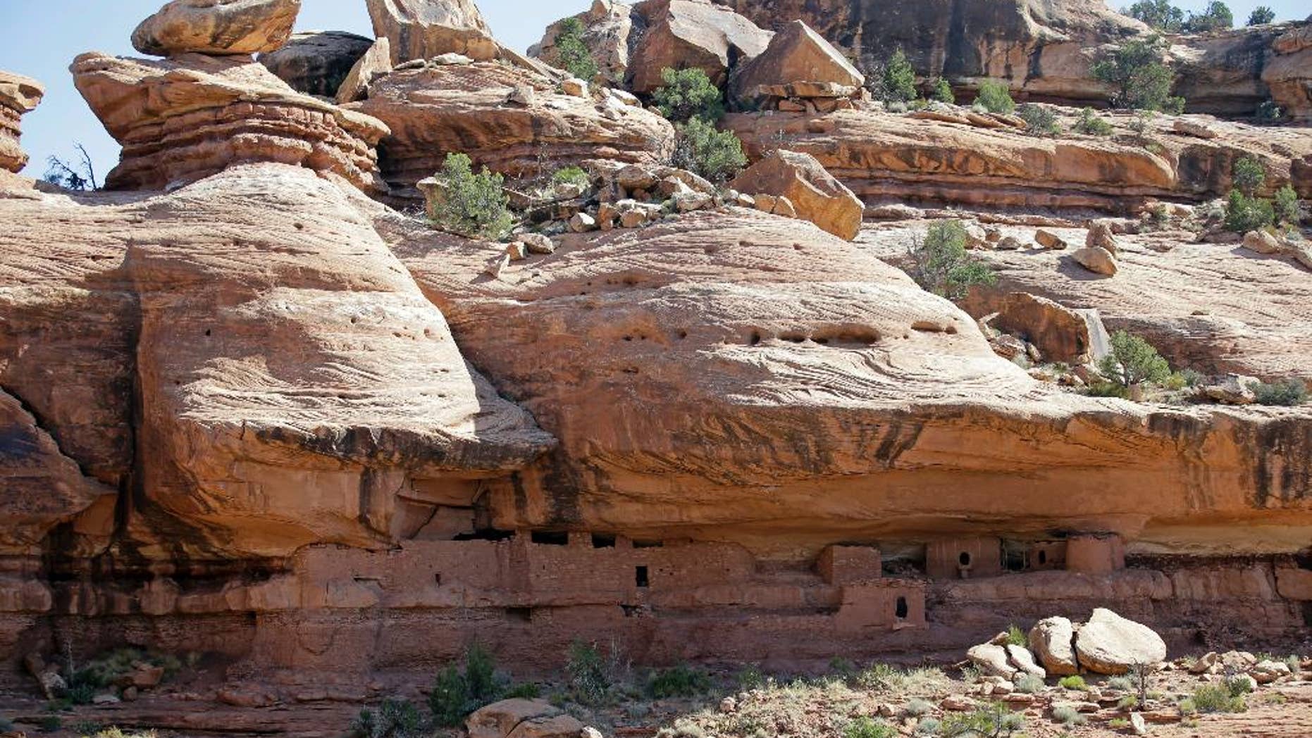 FILE - This July 15, 2016, file photo, shows The "Moonhouse," one of the ancient sites of the Bears Ears region in McLoyd Canyon, near Blanding, Utah. U.S. Interior Secretary Ryan Zinke is set to start a four-day Utah trip on Sunday, May 7, 2017, to assess whether the designation of 3.2 million acres of national monuments in the state's southern red rock region should be scaled back or rescinded. Zinke will spend Sunday, May 7, 2017, in Salt Lake City before traveling Monday, May 8, 2017, to the southeastern corner of Utah to spend time in the Bears Ears region. (AP Photo/Rick Bowmer, File)