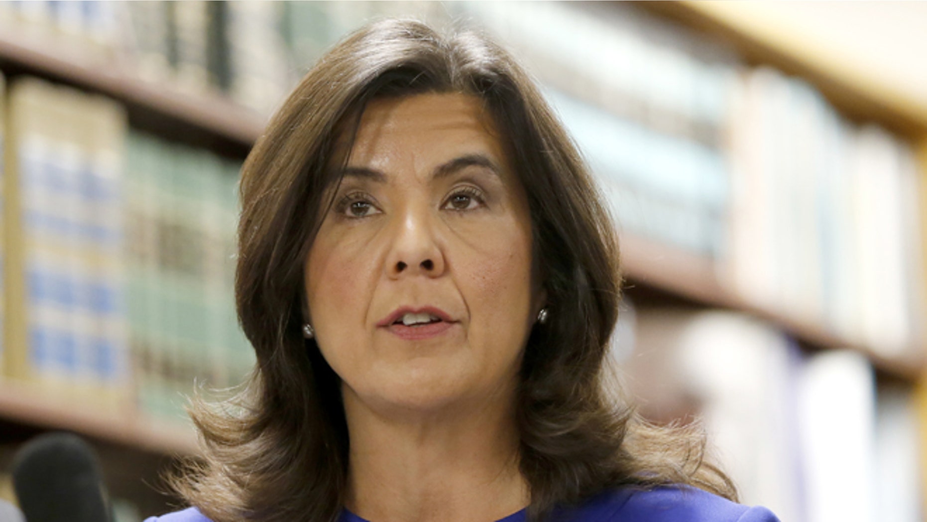Cook County State's Attorney Anita Alvarez talks to reporters after the bond hearing for Chicago police officer Jason Van Dyke, on murder charges in the killing of 17-year-old Laquan McDonald, Tuesday, Nov. 24, 2015, in Chicago. Van Dyke's hearing is just a day ahead of a deadline for the city to release a squad-car video of the shooting. (AP Photo/Charles Rex Arbogast)