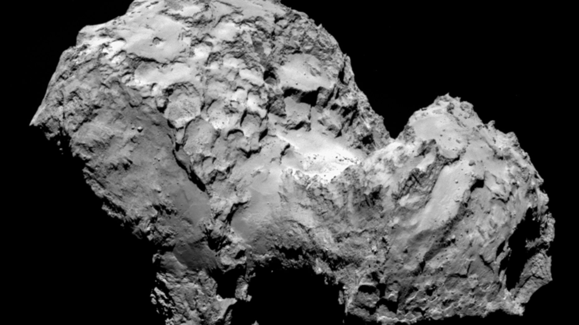 FILE - In this Aug. 3, 2014 file photo taken by Rosetta’s OSIRIS narrow-angle camera Comet 67P/Churyumov-Gerasimenko is pictured from a distance of 285 kms. Scientists at the European Space Agency on Monday, Sept. 15, 2014, announced the spot where they will attempt the first landing on a comet hurtling through space at 55,000 kph (34,000 mph). The maneuver is one of the key moments in the decade-long mission to examine the comet and learn more about the origins and evolution of objects in the universe. (AP Photo/ESA/Rosetta/MPS for OSIRIS Team, File )