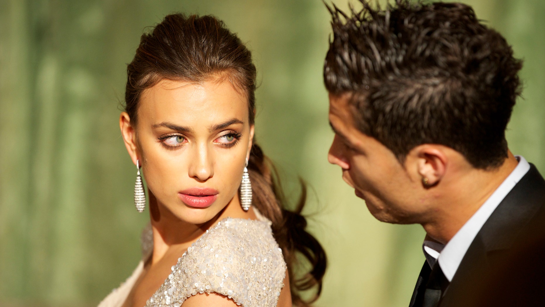 MADRID, SPAIN - NOVEMBER 17: Model Irina Shayk and Real Madrid player Cristiano Ronaldo attend Marie Claire Prix de la Moda awards 2011 at French Embassy on November 17, 2011 in Madrid, Spain. (Photo by Carlos Alvarez/Getty Images)