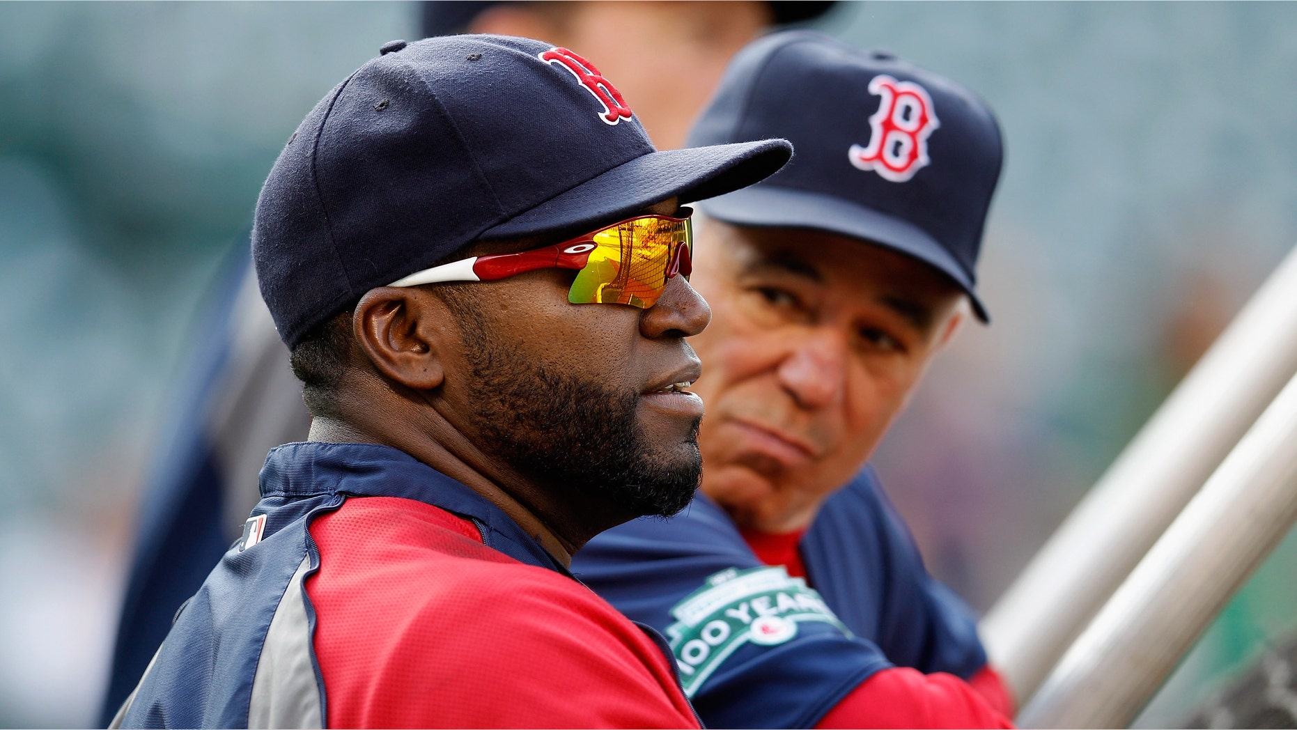BALTIMORE, MD - MAY 22: Manager Bobby Valentine (R) and David Ortiz #34 of the Boston Red Sox look on during batting practice before the start of the Red Sox game against the Baltimore Orioles at Oriole Park at Camden Yards on May 22, 2012 in Baltimore, Maryland. (Photo by Rob Carr/Getty Images)