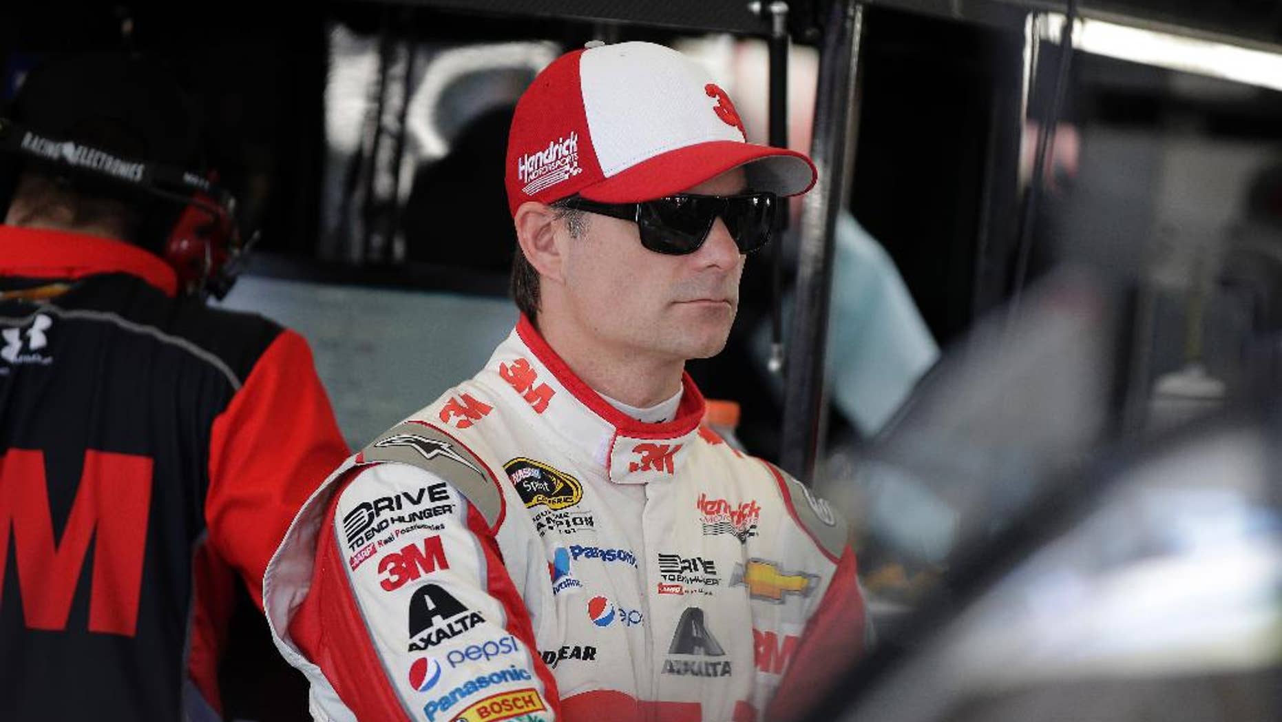 Jeff Gordon works in the garage during practice for Sunday's NASCAR Sprint Cup Series auto race Friday, March 6, 2015, in Las Vegas. Gordon went on to win the pole position. (AP Photo/Isaac Brekken)