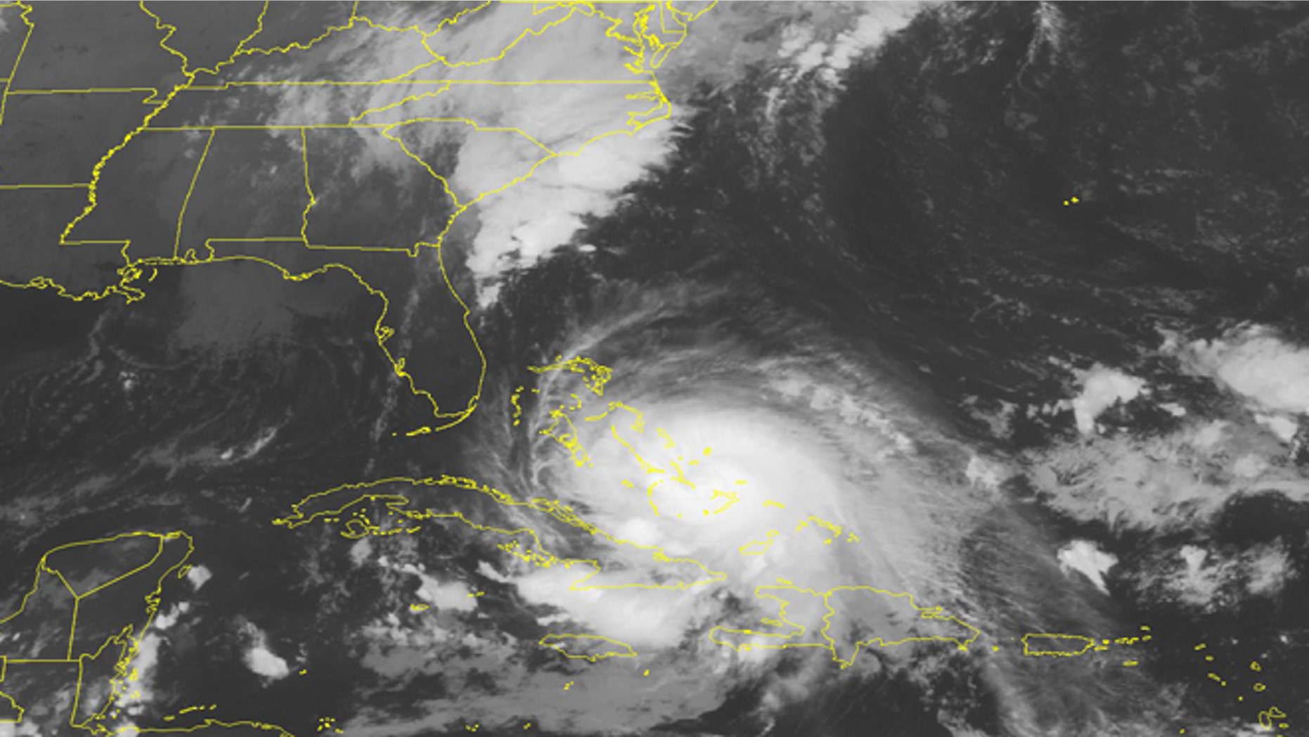 This NOAA satellite image taken Friday, Oct. 2, 2015 at 12:45 AM EDT shows a powerful Category 4 Hurricane Joaquin crawling through the Bahamas. (Weather Underground via AP)