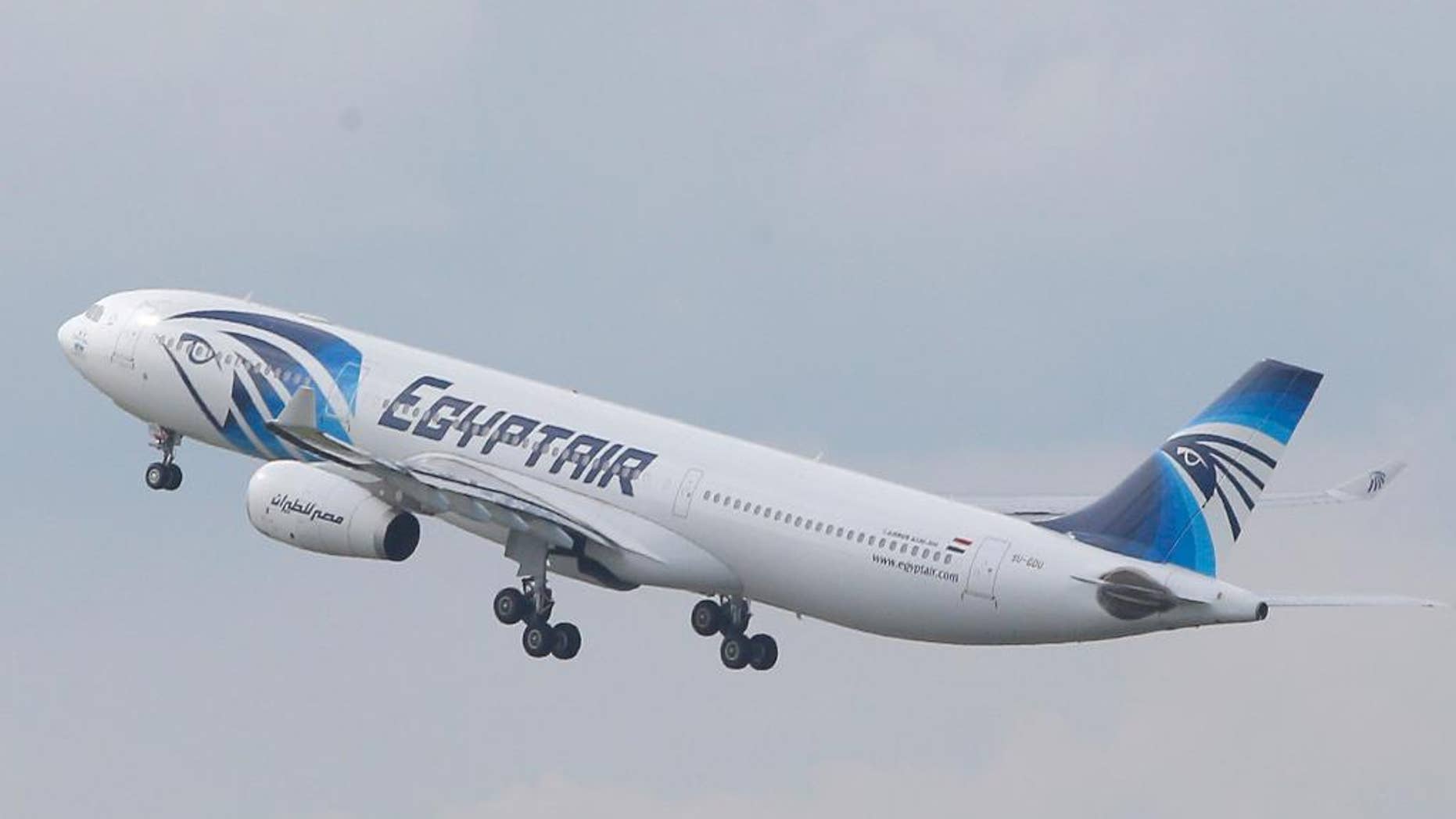 FILE - In this May 19, 2016 file photo, an EgyptAir Airbus A330-300 takes off for Cairo from Charles de Gaulle Airport outside of Paris. Egyptians officials say a bomb threat has forced an EgyptAir airliner en route to Beijing from Cairo to make an emergency landing in Uzbekistan, where the aircraft is being searched. (AP Photo/Christophe Ena, File)