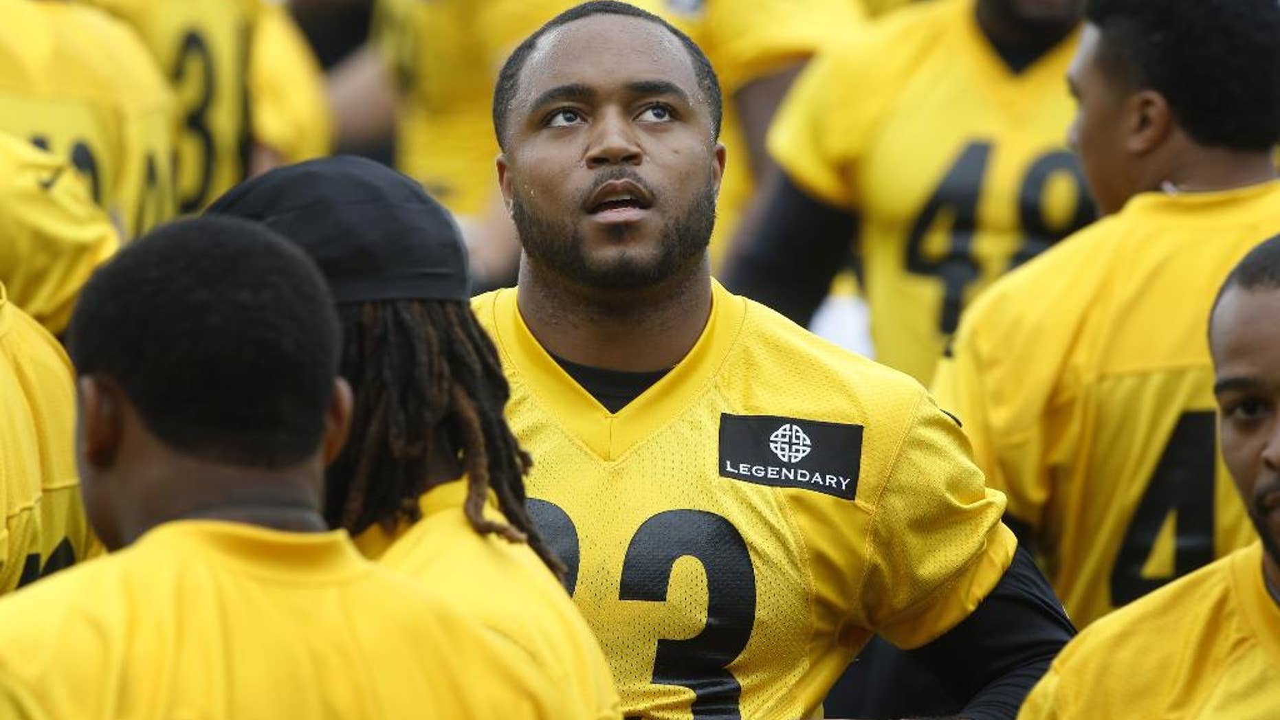 Pittsburgh Steelers safety Mike Mitchell, center, goes through drills with the defense during an NFL football organized team activity on Thursday, May 29, 2014 in Pittsburgh. (AP Photo/Keith Srakocic)
