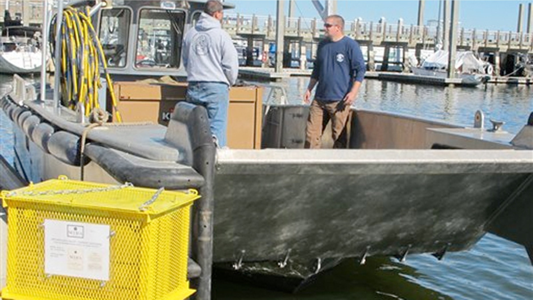 Feb. 20, 2013: Bottles of Cabernet Sauvignon in protective steel cages, left, are ready to be loaded onto a boat in Charleston, S.C.