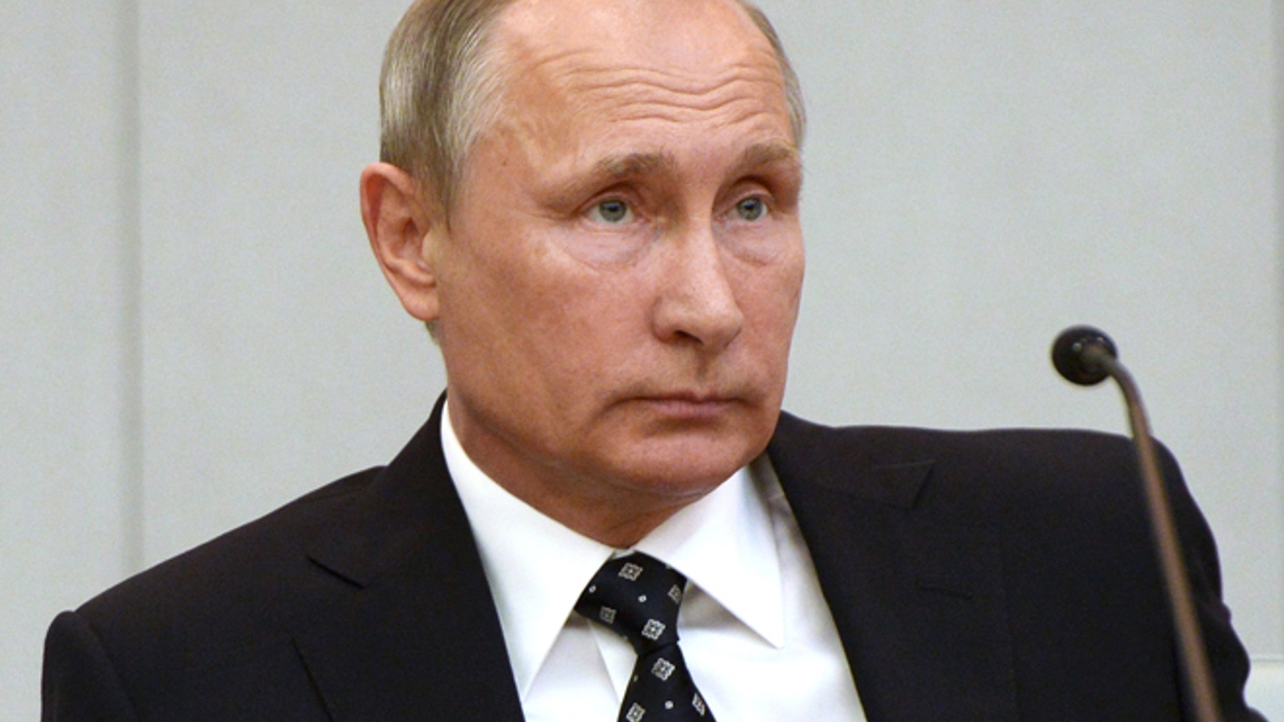 OCT 5: Russian President Vladimir Putin listens during the opening session of the newly elected State Duma, Russia's lower house of parliament.