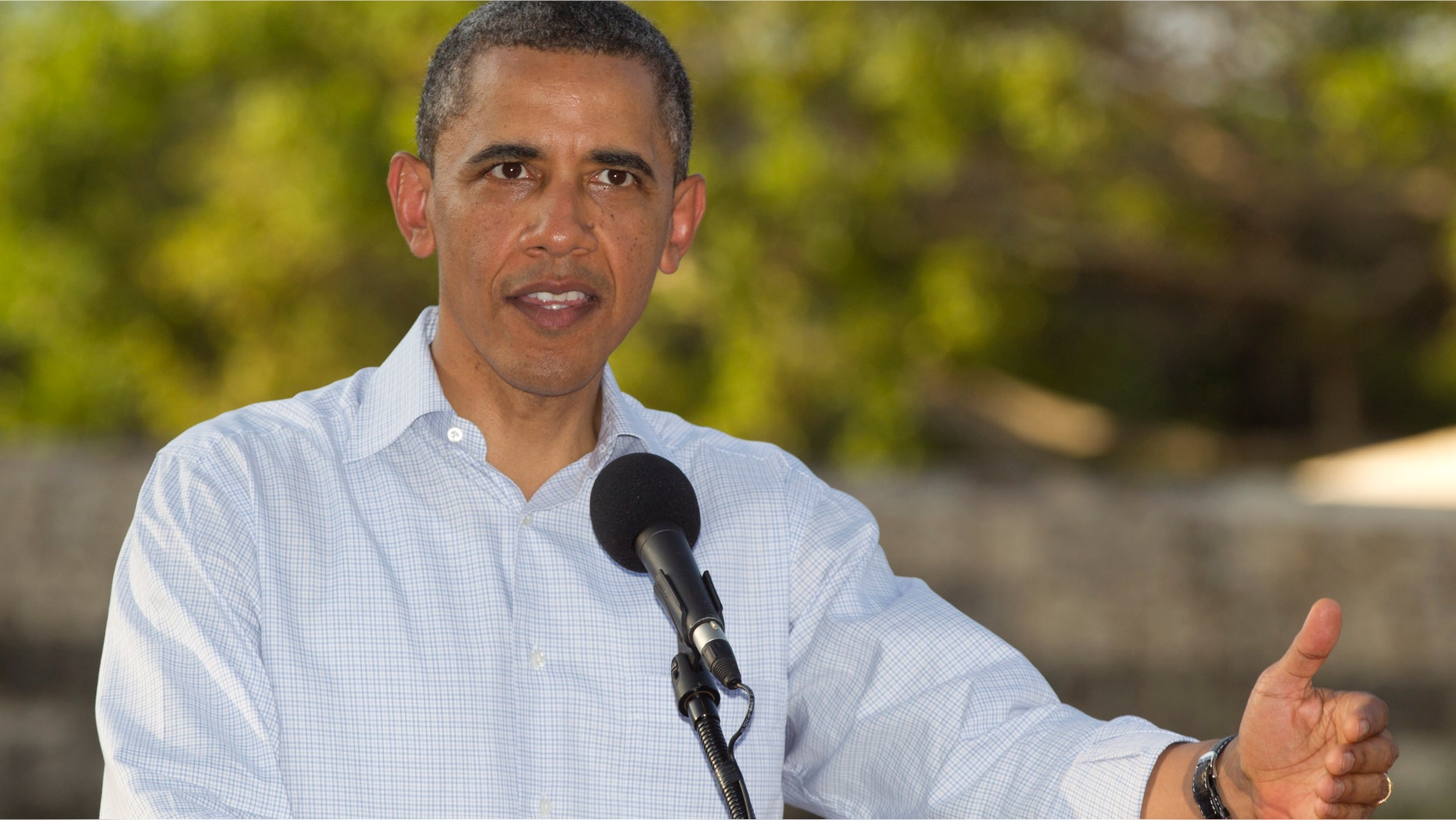 President Barack Obama speaks during a joint news conference with Colombian President Juan Manuel Santos during the 6th Summit of the Americas in Cartagena, Colombia, Sunday, April 15, 2012. (AP Photo/Carolyn Kaster)