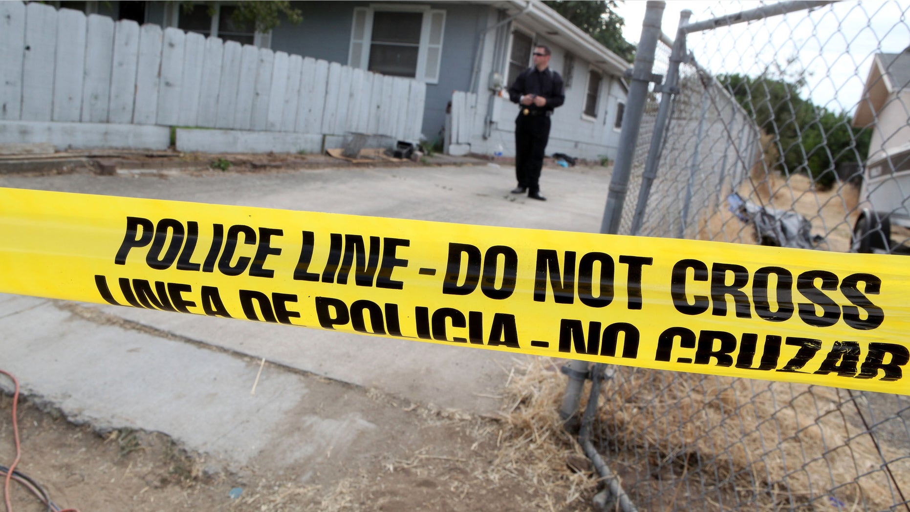 ANTIOCH, CA - AUGUST 28: Yellow police tape is stretched across the front of the home of alleged kidnapper Phillip Garrido as they search the property August 28, 2009 in Antioch, California. Jaycee Lee Dugard was allegedly kidnapped by Phillip Garrido nearly two decades ago and was forced to live in tents and sheds behind Garrido's home with two of her children that were fathered by Garrido. Pittsburg police are also searching Garrido's home for evidence linking him to the murders of prostitutes in the 1990's. (Photo by Justin Sullivan/Getty Images)