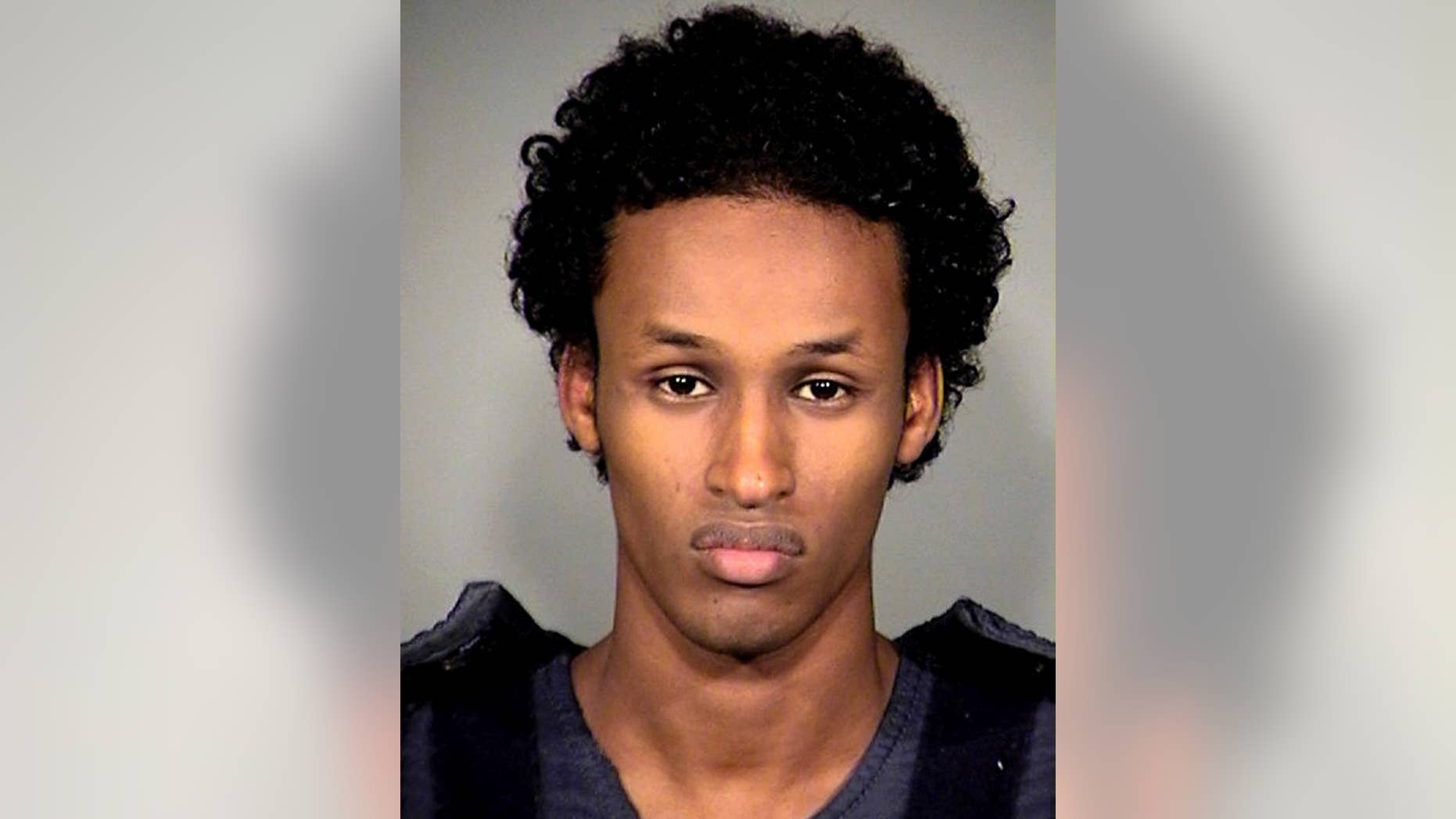 FILE -This Nov. 27, 2010, file photo provided by the Multnomah County Sheriff's Office shows Mohamed Mohamud. Convicted of trying to detonate a bomb at a tree-lighting ceremony in Portland, Ore., Nov. 26, 2010, Mohamud is seeking a new trial. An Appeals Court will hear oral arguments in Portland, Ore., Wednesday, July 6, 2016, one argument which is a challenge to warrantless surveillance. (AP Photo/Multnomah County Sheriff's Office, File)