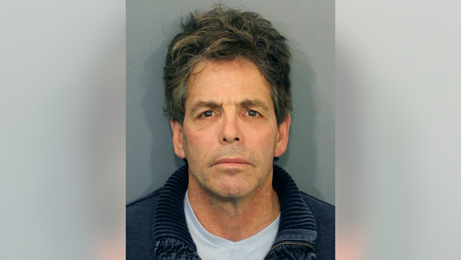 This booking photo released by the Fall River, Mass., Police Department shows Paul Haddad, 55, of Westwood, Mass., arrested and arraigned Friday, March 27, 2015, on charges he called in a bomb threat Thursday that forced the evacuation of the Massachusetts courthouse where former New England Patriots player Aaron Hernandez's murder trial is being held. Police said Thursday's threat had nothing to do with Hernandez. (AP Photo/Fall River Police Department)