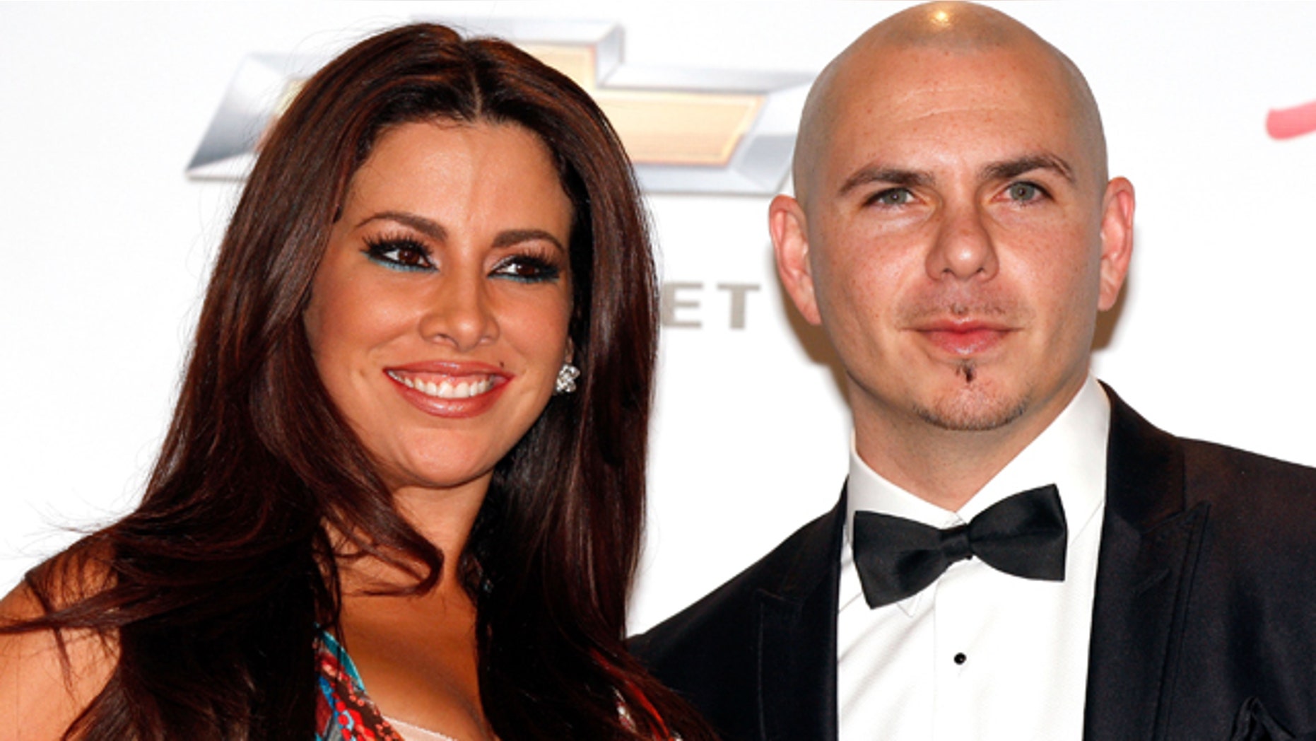 May 22, 2011:Model Nayer and Pitbull pose in the press room during the 2011 Billboard Music Awards at the MGM Grand Garden Arena in Las Vegas, Nev.