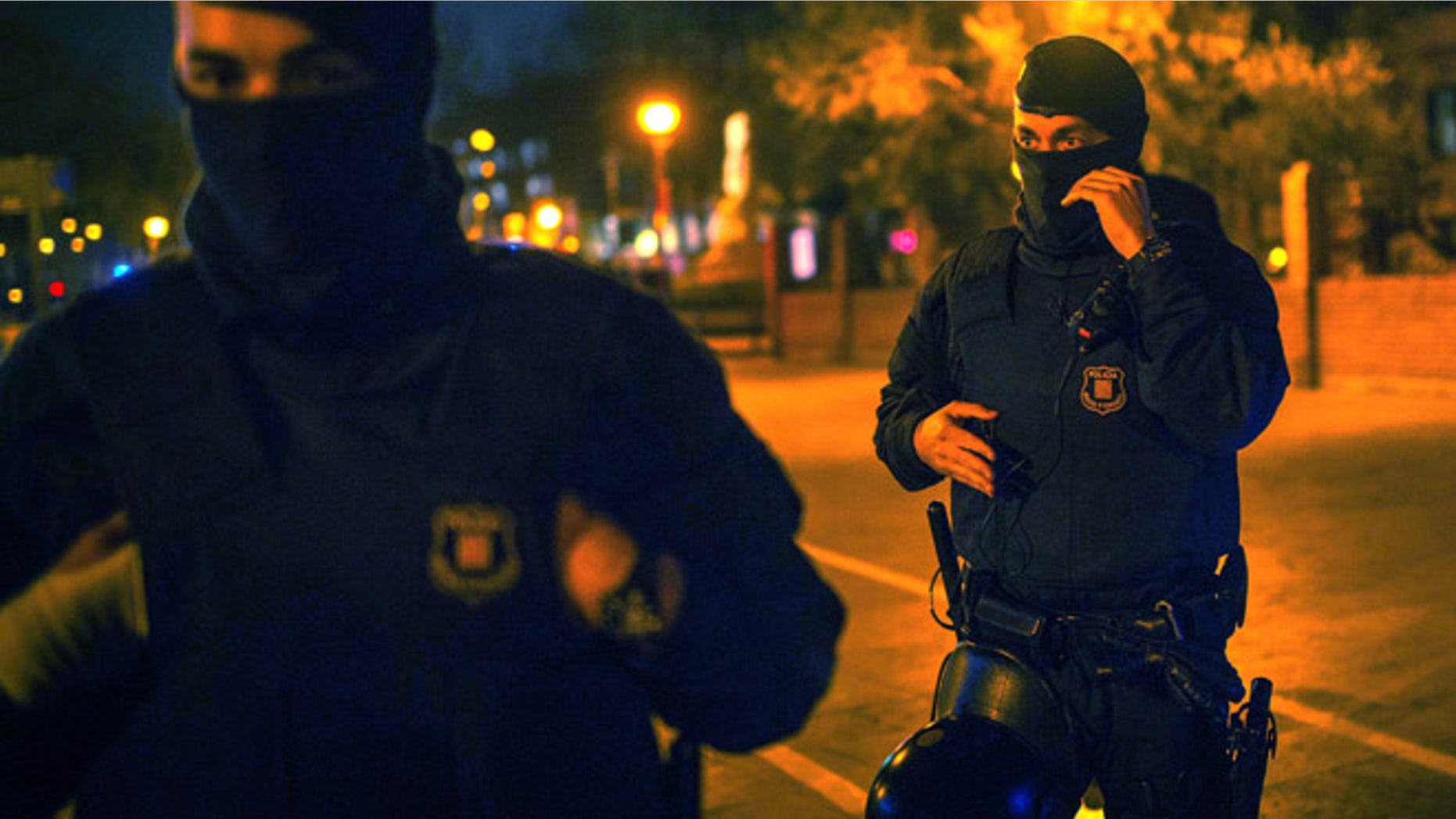 BARCELONA, SPAIN - MARCH 11: Catalan Autonomous riot police officers stand guard at the first Pegida rally on March 11, 2015 in Barcelona, Spain. Pegida Catalonia has called for the first Pegida Spain march in on the 11th anniversary of the 2004 Madrid train bombings. (Photo by David Ramos/Getty Images)