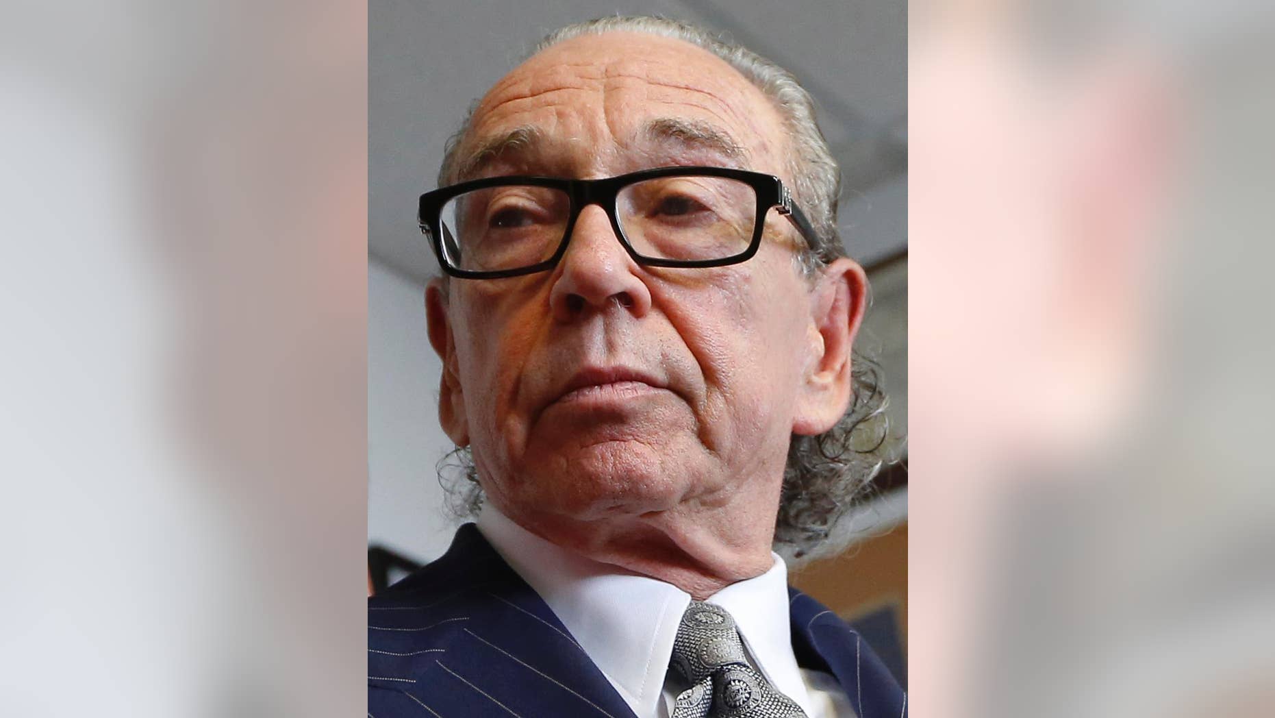FILE - In this Sept. 24, 2014, file photo, attorney Sanford A. Rubenstein appears at a news conference at his offices in New York. Prosecutors say Rubenstein, who once represented the family of Eric Garner who was killed in a police chokehold, won't face criminal charges after being accused of rape. A spokeswoman for the Manhattan district attorney, said Monday Jan 5, 2015 that prosecutors had decided no charges were warranted against Rubenstein was accused of assaulting a woman who's a member of the Rev. Al Sharpton's National Action Network. (AP Photo/Kathy Willens, File)