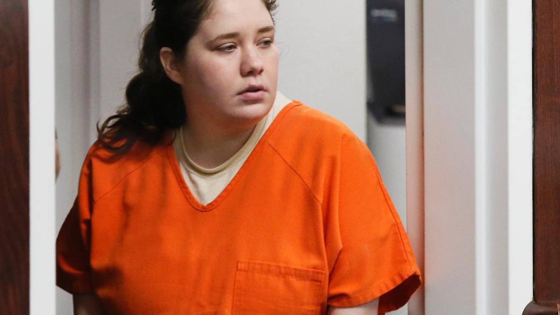 FILE - In this June 1, 2016, file photo, Adacia Chambers arrives for a court hearing in Stillwater, Okla. Chambers is charged with killing four people after crashing into a crowd at the Oklahoma State homecoming parade last Oct. 24. More than 200 potential witness names are on the list filed by prosecutors in Payne County District Court in the case against Chambers. The trial is scheduled to start Jan. 10, 2017. (AP Photo/Sue Ogrocki, File)