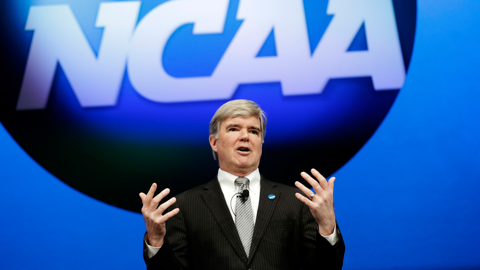 FILE - In this Jan. 17, 2013, file photo, NCAA President Mark Emmert speaks at the organization's annual convention in Grapevine, Texas. The NCAA is revealing that it has found "an issue of improper conduct" within its own enforcement program during its investigation into the compliance practices of Miami's athletic department. Emmert has ordered an external review of the enforcement program. Miami will not receive its notice of allegations until that review is complete. (AP Photo/LM Otero, File)