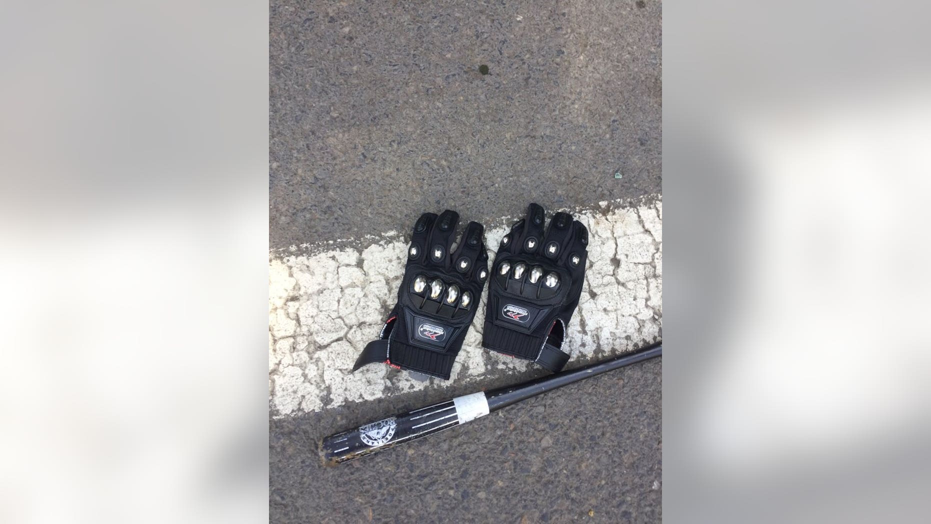 Police confiscated items such as gloves and a bat before allowing demonstrators to rally in Portland Sunday.