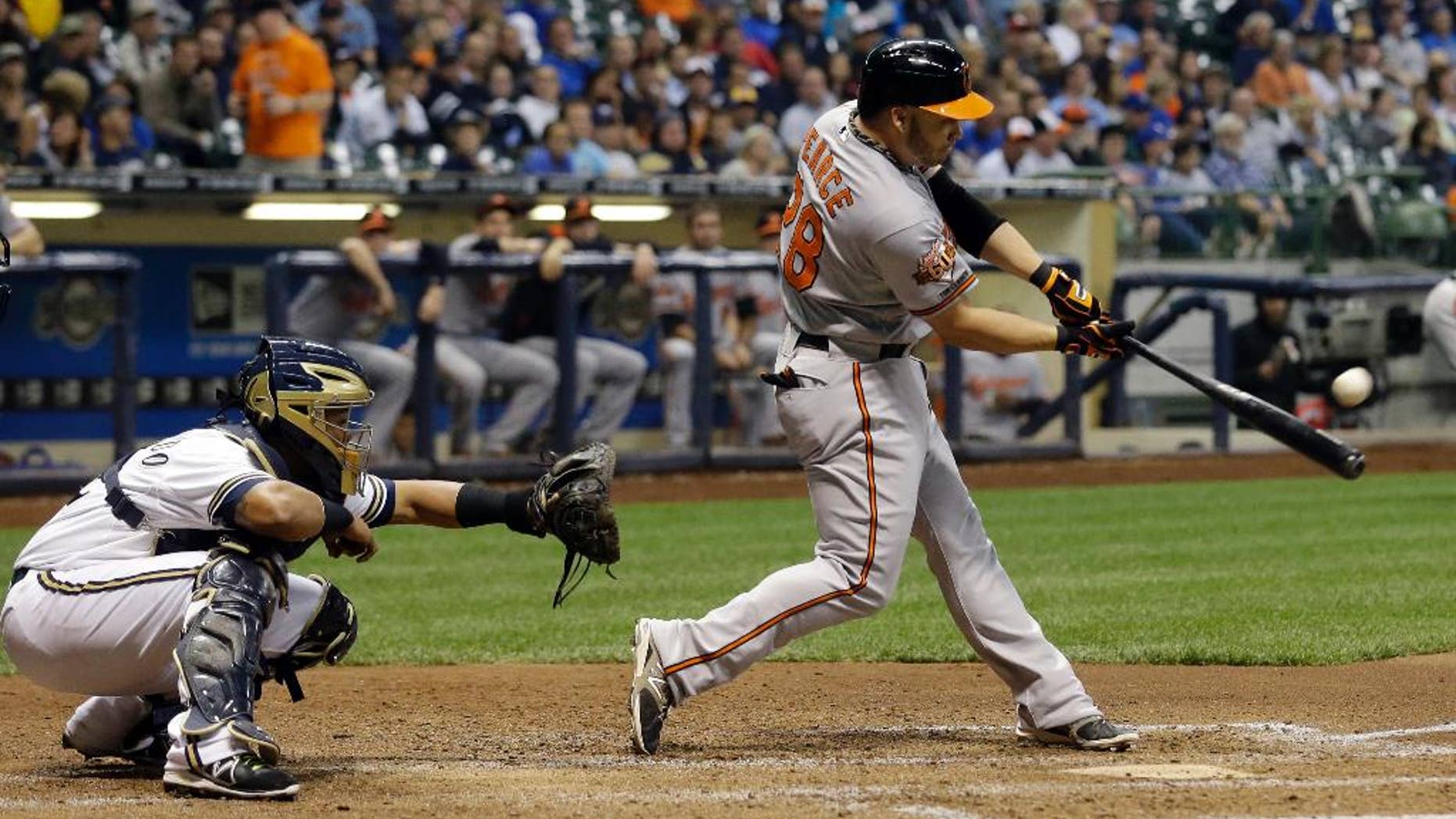 Baltimore Orioles' Steve Pearce hits a three-run home run during the seventh inning of a baseball game against the Milwaukee Brewers Tuesday, May 27, 2014, in Milwaukee. (AP Photo/Morry Gash)