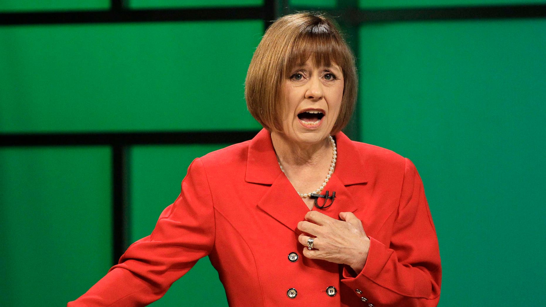 La candidata republicana al Senado Sharron Angle durante un debate ante el demócrata Harry Reid transmitido por televisión en Nevada el jueves 14 de octubre de 2010 en Las Vegas. (Foto AP/Julie Jacobson)