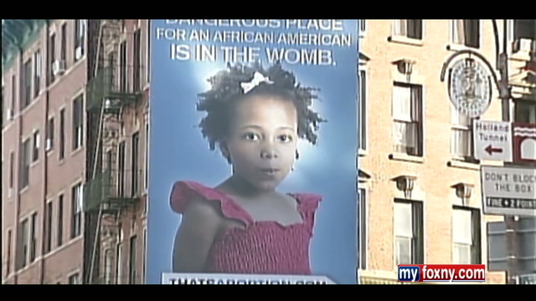 A billboard high above Watts Street and 6th Avenue in lower Manhattan is raising eyebrows over its anti-abortion message which includes an image of a Black girl.
