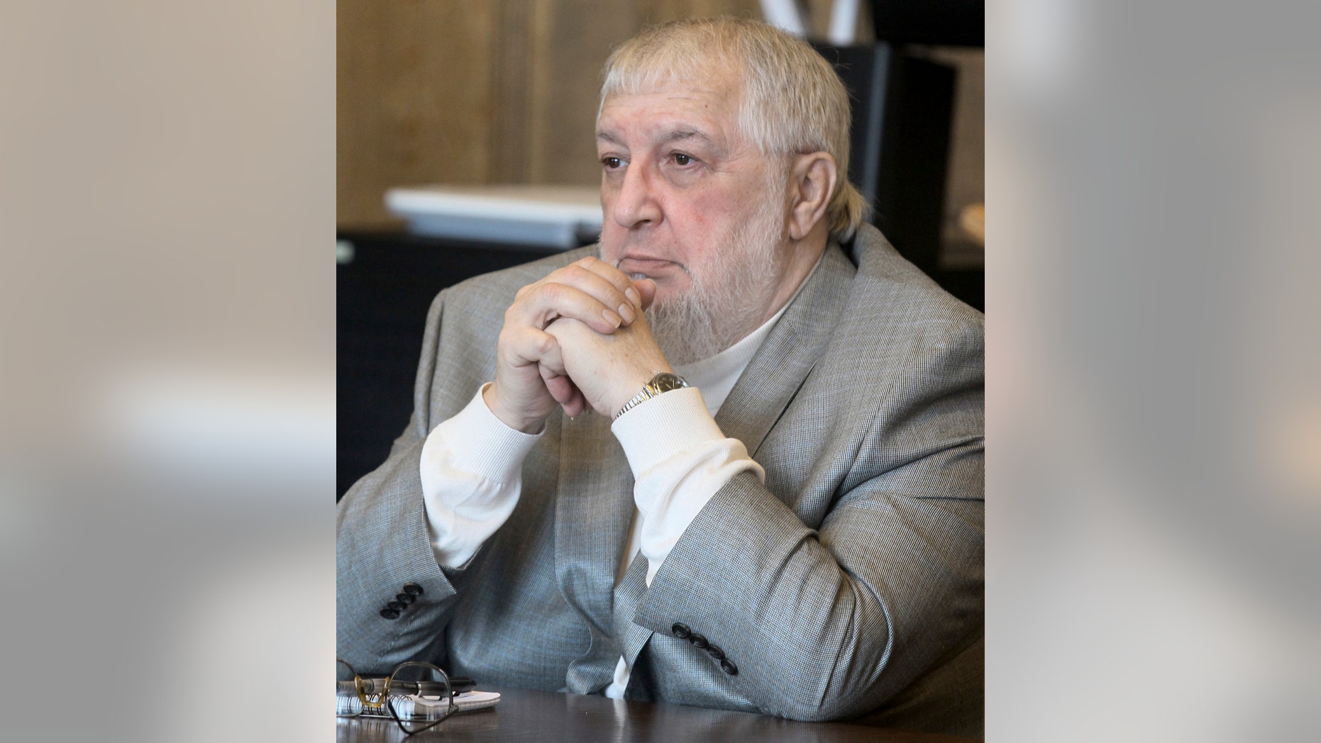 FILE-In this Monday Nov. 4, 2013 file photo, John Wise, 67, waits for opening remarks in Akron, Ohio. Wise was convicted of fatally shooting his ailing wife at a hospital. Attorney Paul Adamson says in an email that the defense plans to launch a campaign for clemency after Wise is sentenced. The sentencing is scheduled Friday, Dec. 13, in Akron. (AP Photo/Akron Beacon Journal, Phil Masturzo, File) MANDATORY CREDIT