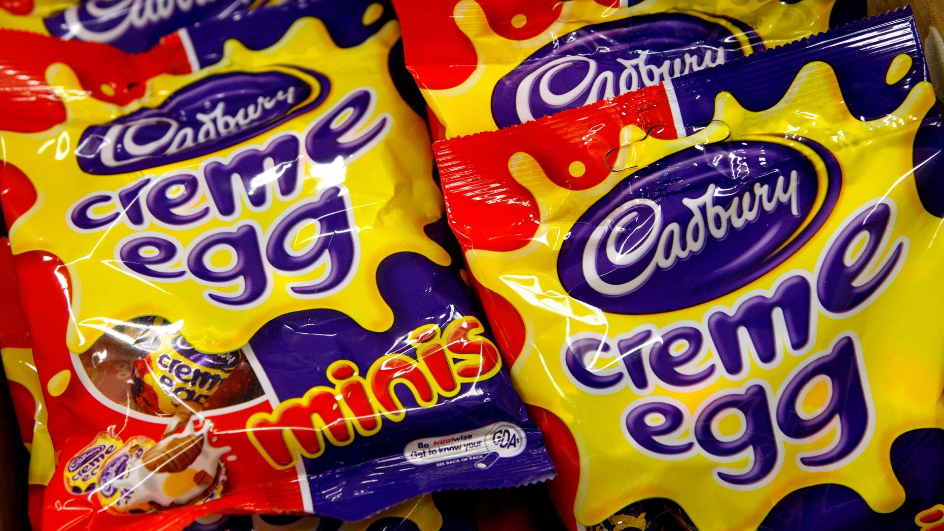 Cadbury's creme eggs minis packages are seen in a London supermarket February 10, 2007. British confectionary group Cadbury Schweppes said on Saturday it was withdrawing a number of Easter chocolate products because they did not have the correct nut allergy labelling. REUTERS/Alessia Pierdomenico (BRITAIN) - RTR1M7UF