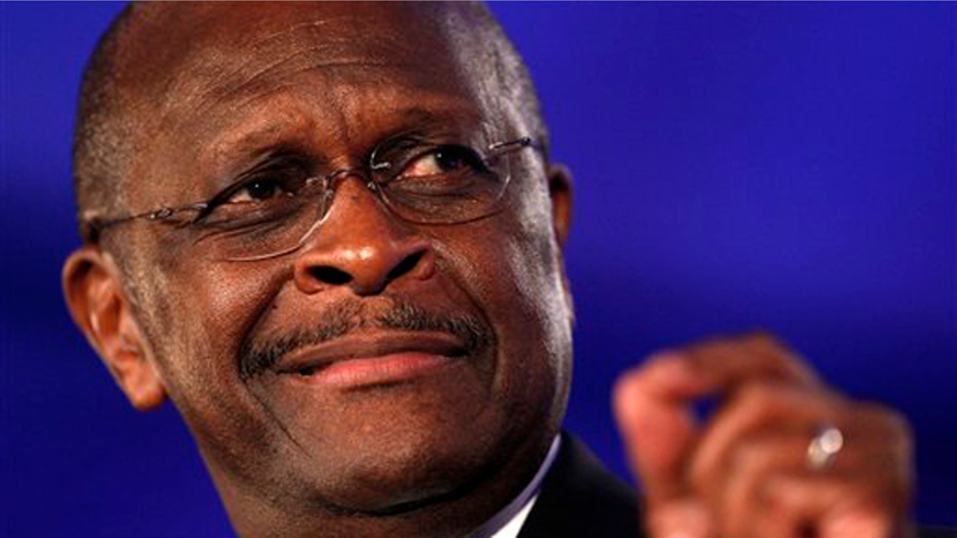 Republican presidential hopeful Herman Cain speaks at the Republican Leadership Conference in New Orleans June 17.