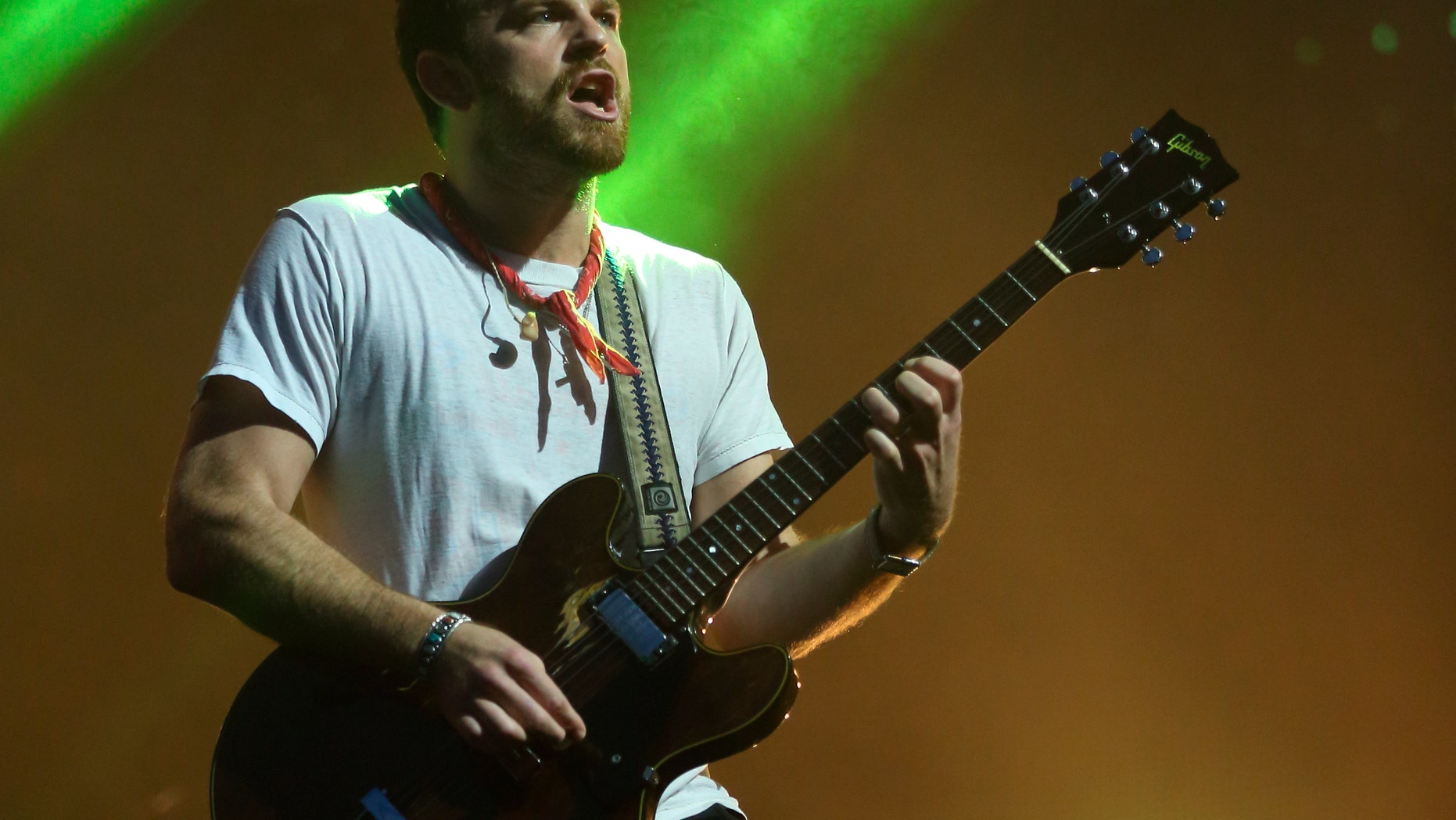 Aug. 3, 2014. Caleb Followill of Kings of Leon performs at Lollapalooza in Chicago's Grant Park.