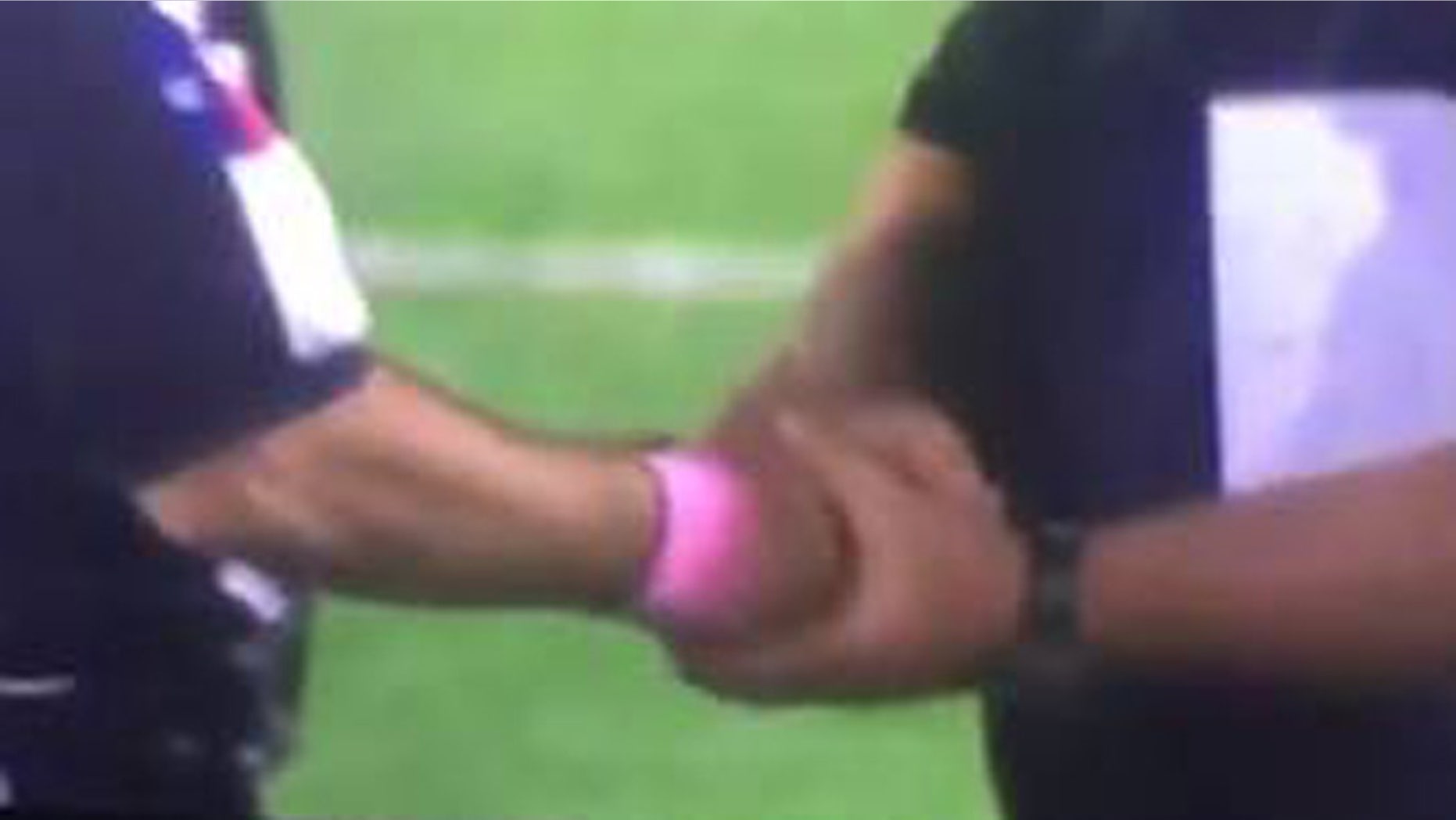 Twitter screenshot of post-game handshake involving referee and Calhoun High's Richard Whitaker.