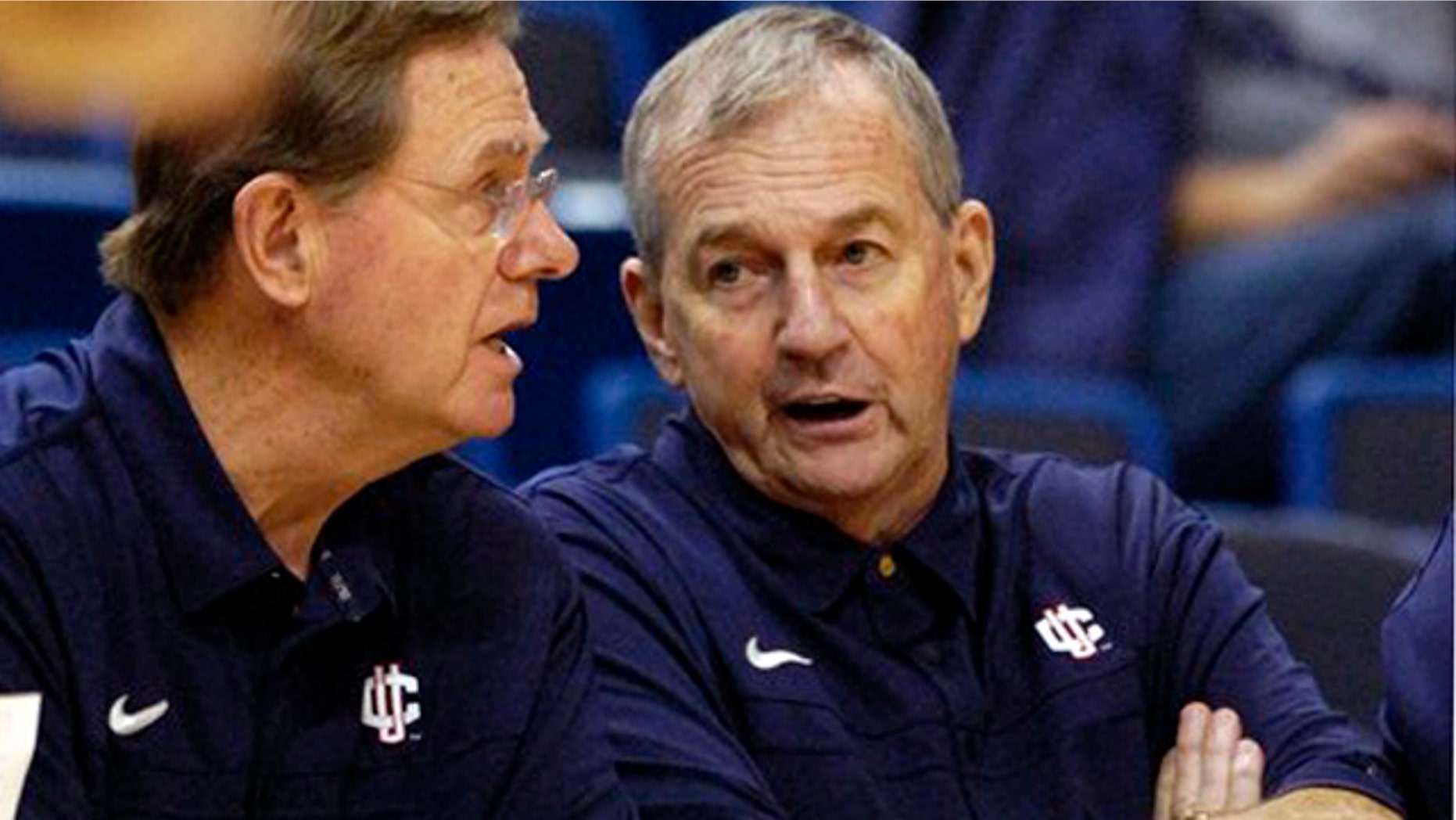 Nov. 7, 2010: Connecticut coach Jim Calhoun, right, speaks with associate head coach George Blaney during the second half of Connecticut's 103-57 victory over Bridgeport in an exhibition NCAA college basketball game in Hartford, Conn. Calhoun announced his retirement Thursday. (AP)