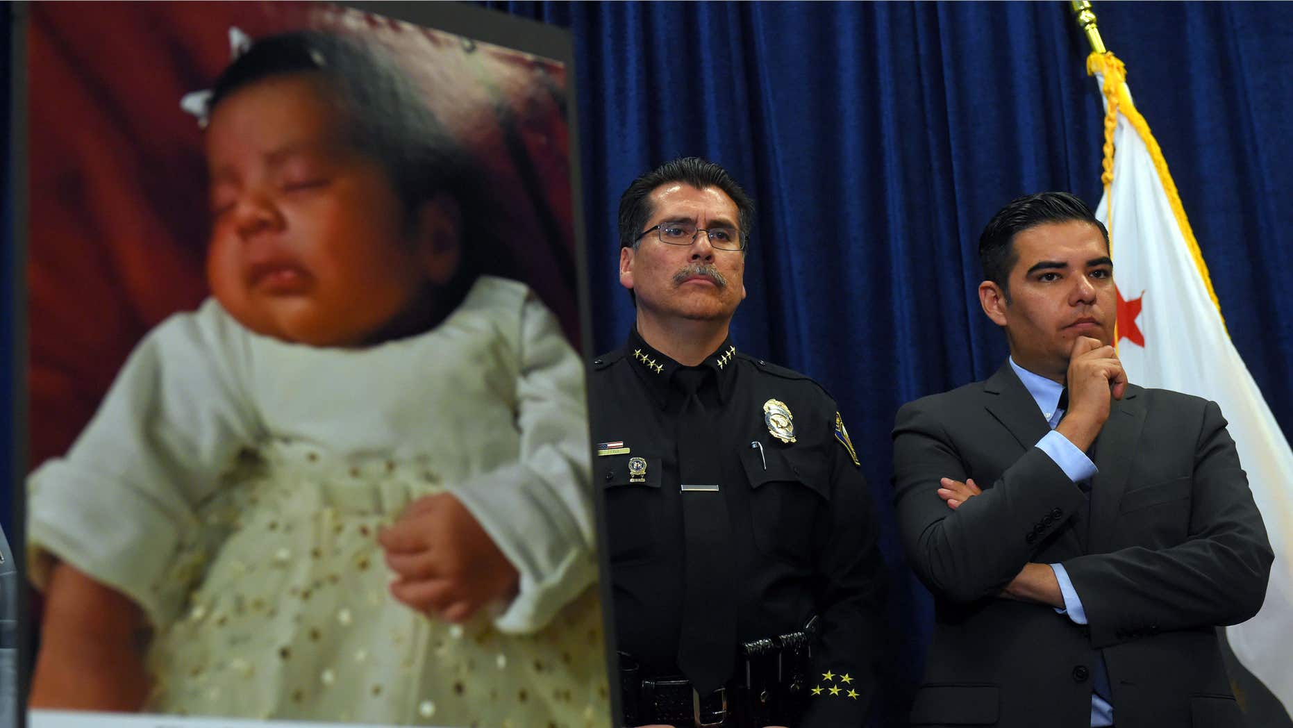 March 25, 2015: Long Beach Police Chief Robert Luna, left, and Mayor Robert Garcia stand during a news conference in Long Beach, Calif.