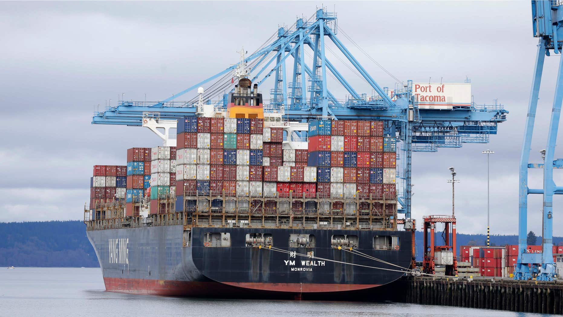 Feb. 20, 2015: A cargo container ship operated by Yang Ming Marine Transport Corp. sits docked at the Port of Tacoma.
