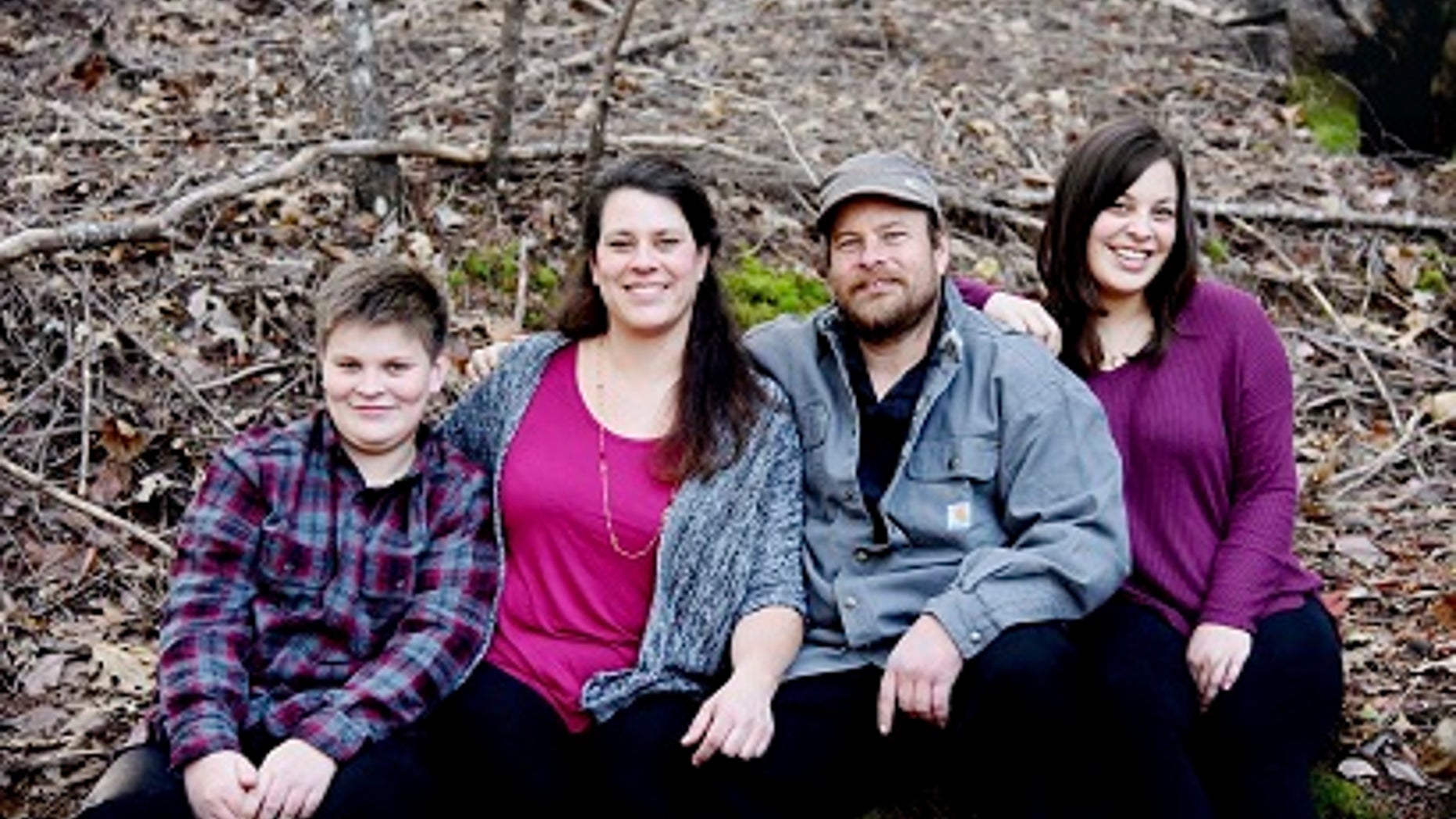 In this undated photo provided by Irma Muniz shows the Shepherd family, Jon and Sara Shepherd and their children, Kressa, and Kai. Kai, left, was killed after a wildfire tore through his family's home in Redwood Valley, Calif. on Monday, Oct. 9, 2017. He was 14 when he died, said his aunt, Mindi Ramos. Sara and 17-year-old daughter, Kressa, both sustained burns on 60% of their bodies. Jon sustained burns on 45% of his body. Relatives are trying to raise money to cover medical expenses and prepare to eventually bring the family to live with Sara's parents' home in Redwood Valley. (Irma Muniz via AP)