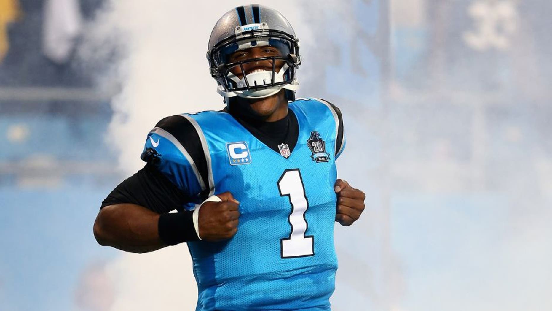 CHARLOTTE, NC - SEPTEMBER 21: Cam Newton #1 of the Carolina Panthers makes his entrance against the Pittsburgh Steelers during the game at Bank of America Stadium on September 21, 2014 in Charlotte, North Carolina. (Photo by Streeter Lecka/Getty Images)