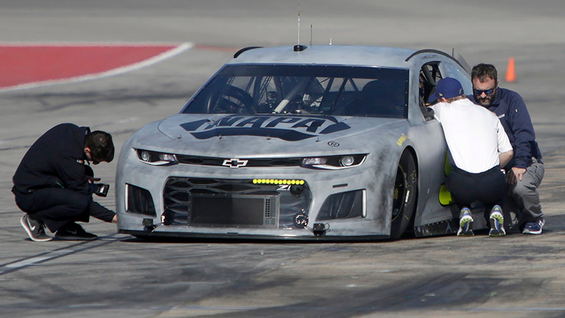 Chase Elliott pulls in to pit row while participating in NASCAR tire tests at Texas Motor Speedway in Fort Worth, Texas, Tuesday, Jan. 9, 2018. (Brad Loper/Star-Telegram via AP)