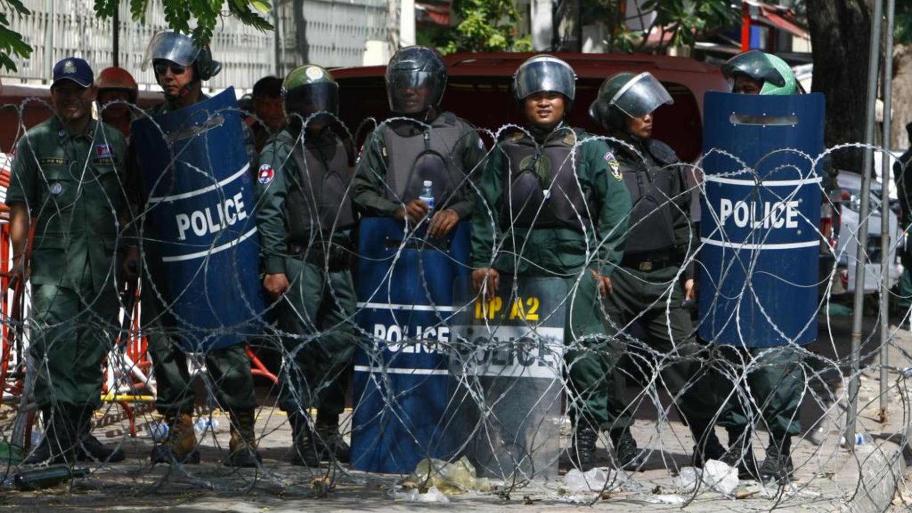 Riot police in Phnom Penh, Cambodia, in 2014.