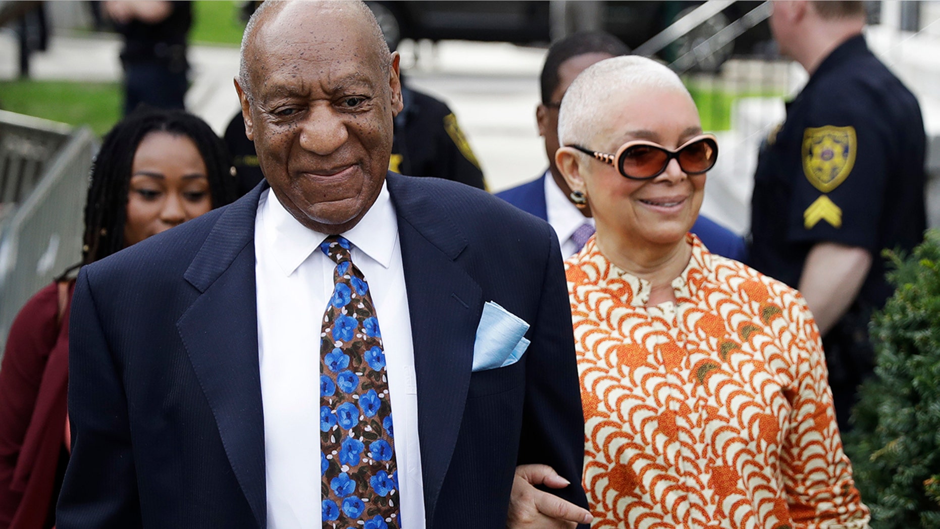 Bill Cosby, left, arrives with his wife, Camille, for his sexual assault trial, Tuesday, April 24, 2018, at the Montgomery County Courthouse in Norristown, Pa.