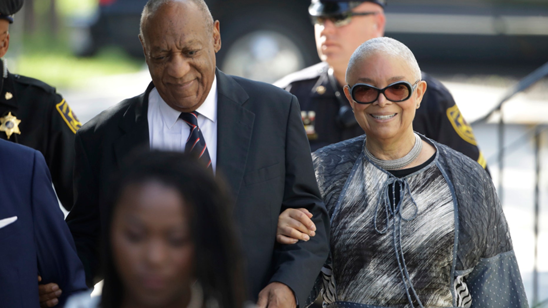 Bill Cosby arrives for his sexual assault trial with his wife Camille Cosby, right, at the Montgomery County Courthouse in Norristown, Pa., Monday, June 12, 2017.