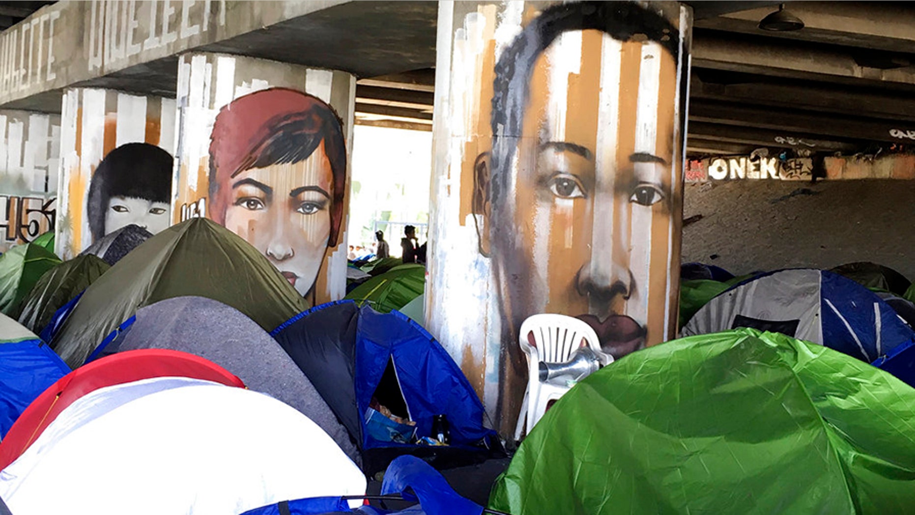 The French government is looking to evacuate two migrant camps near Paris