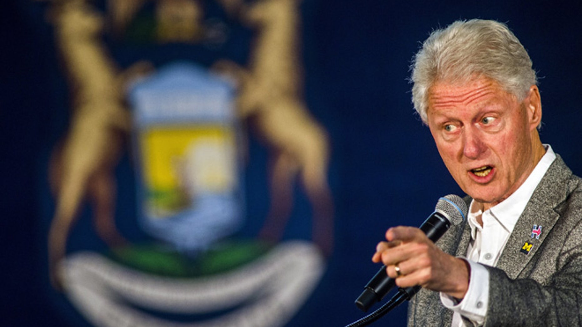 Former President Bill Clinton speaks, Monday, Oct. 3, 2016 at Northbank Center in downtown Flint, Mich. Clinton is campaigning for his wife, 2016 Democratic presidential nominee Hillary Clinton, in Michigan. (Jake May/The Flint Journal via AP)