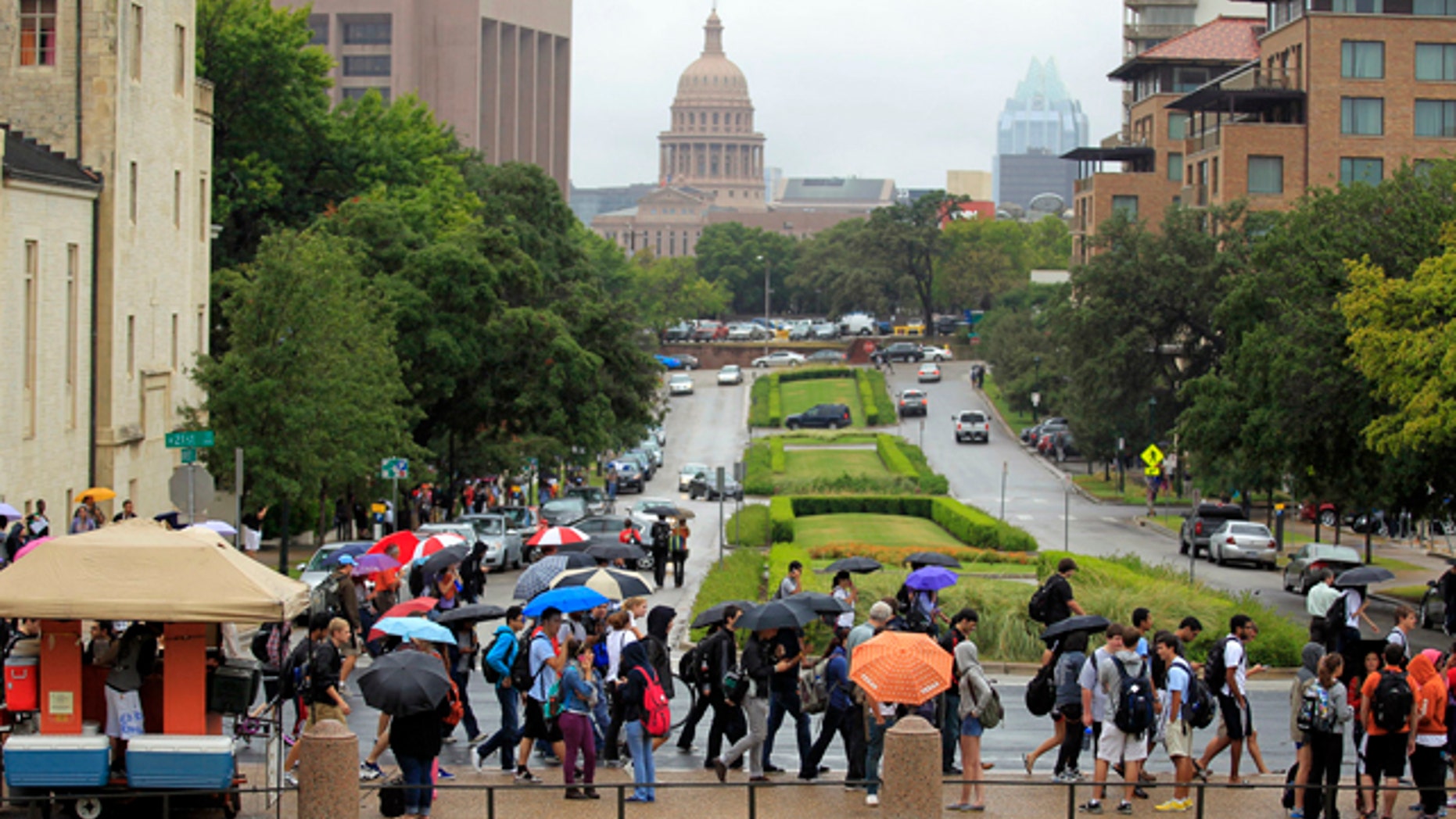 Sept. 14, 2012: University of Texas students evacuate campus after the university received a bomb threat Friday morning in Austin, Texas. The university received a call about 8:35 a.m. local time from a man claiming to be with Al Qaeda who said he had placed bombs all over the 50,000-student campus, according to University of Texas spokeswoman Rhonda Weldon. (AP)