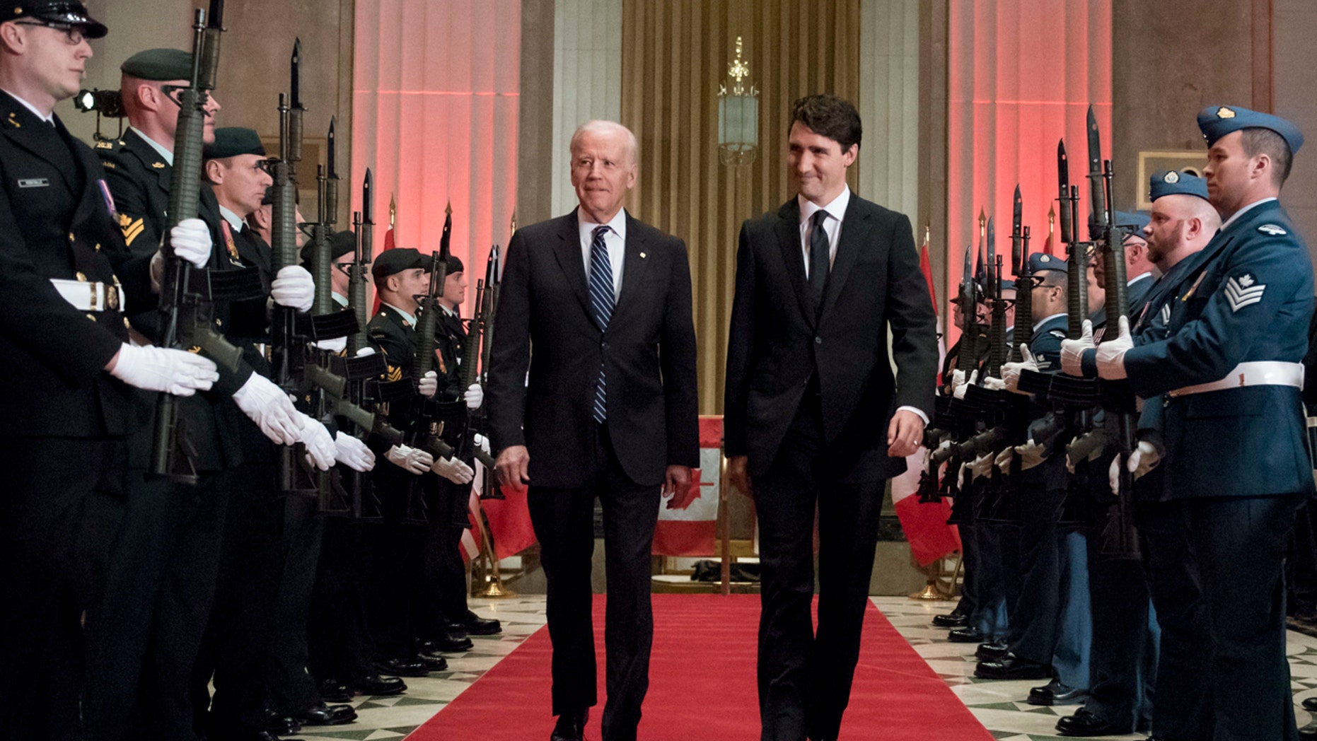 Prime Minister Justin Trudeau and U.S. Vice-President Joe Biden arrive at a state dinner on Thursday, Dec. 8, 2016 in Ottawa. (Justin Tang/The Canadian Press via AP)