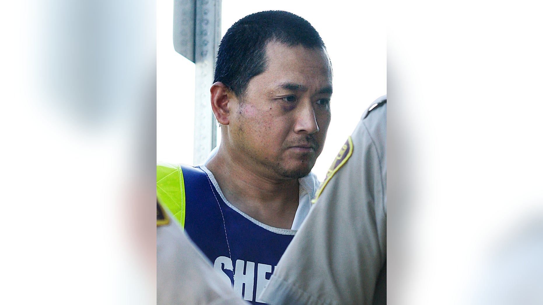 File- This Aug. 5, 2008, file photo shows Vince Li. Li, who was found not criminally responsible for beheading and cannibalizing a fellow passenger on a Greyhound bus has been granted his freedom. Manitoba's Criminal Code Review Board announced Friday, Feb. 10, 2017, it has given Will Baker, formerly known as Vince Li, an absolute discharge, meaning he is longer subject to monitoring. (John Woods/The Canadian Press via AP, File)